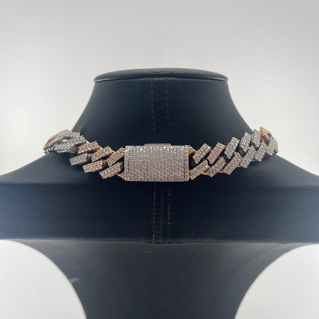 CB STORES 14ct diamond prong Cuban chain displayed on a black jewellery stand with a plain white background.