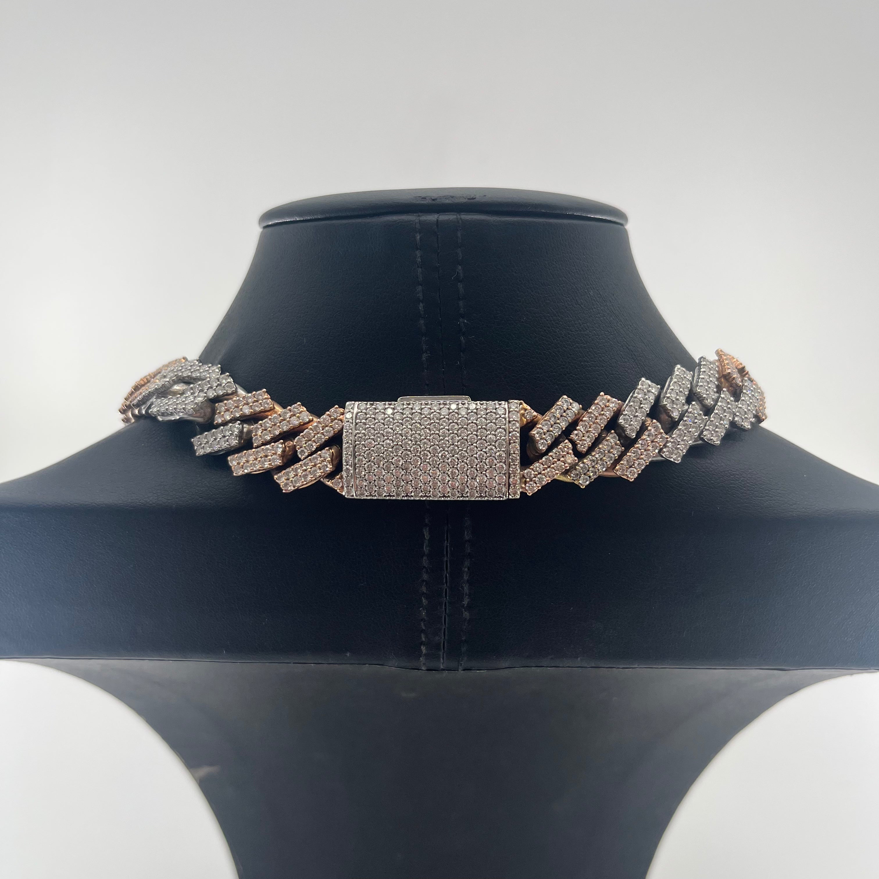 CB STORES 14ct diamond prong Cuban chain displayed on a black jewellery stand with a plain white background.