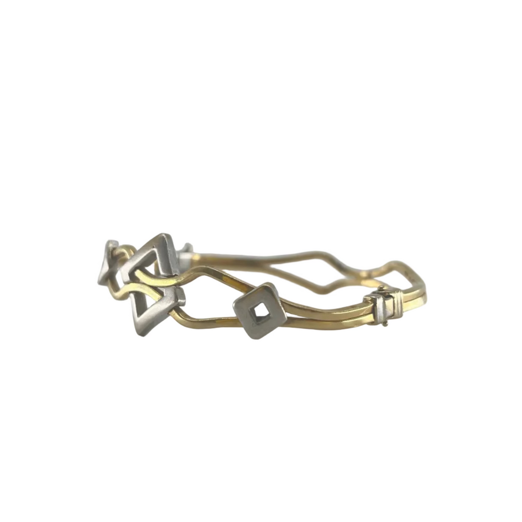 14ct Star Bangle 2.6" Carat: 14ct Gold Colour: Yellow & White Gold Size: 2.6" (Width) Weight: 10.67g