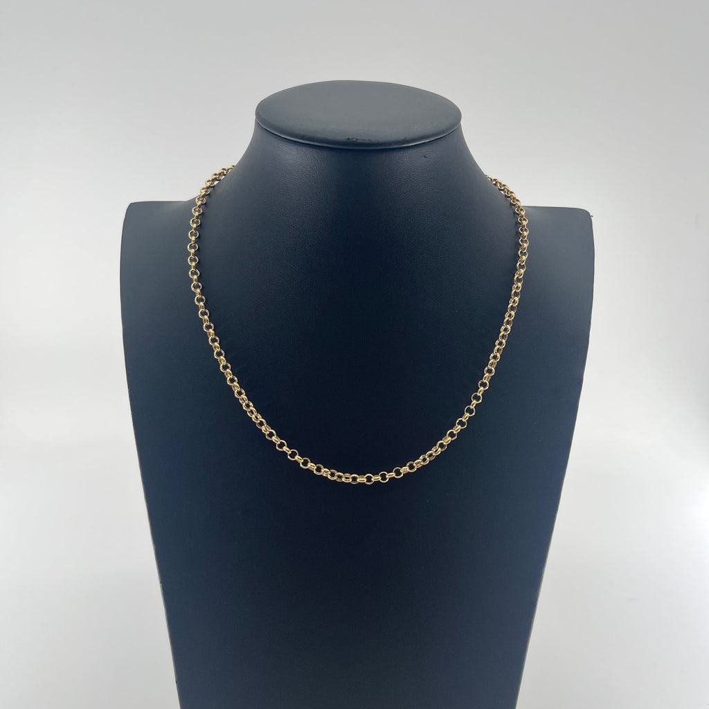 CB Stores yellow gold chain necklace with small round links, displayed on a black bust against a white background.