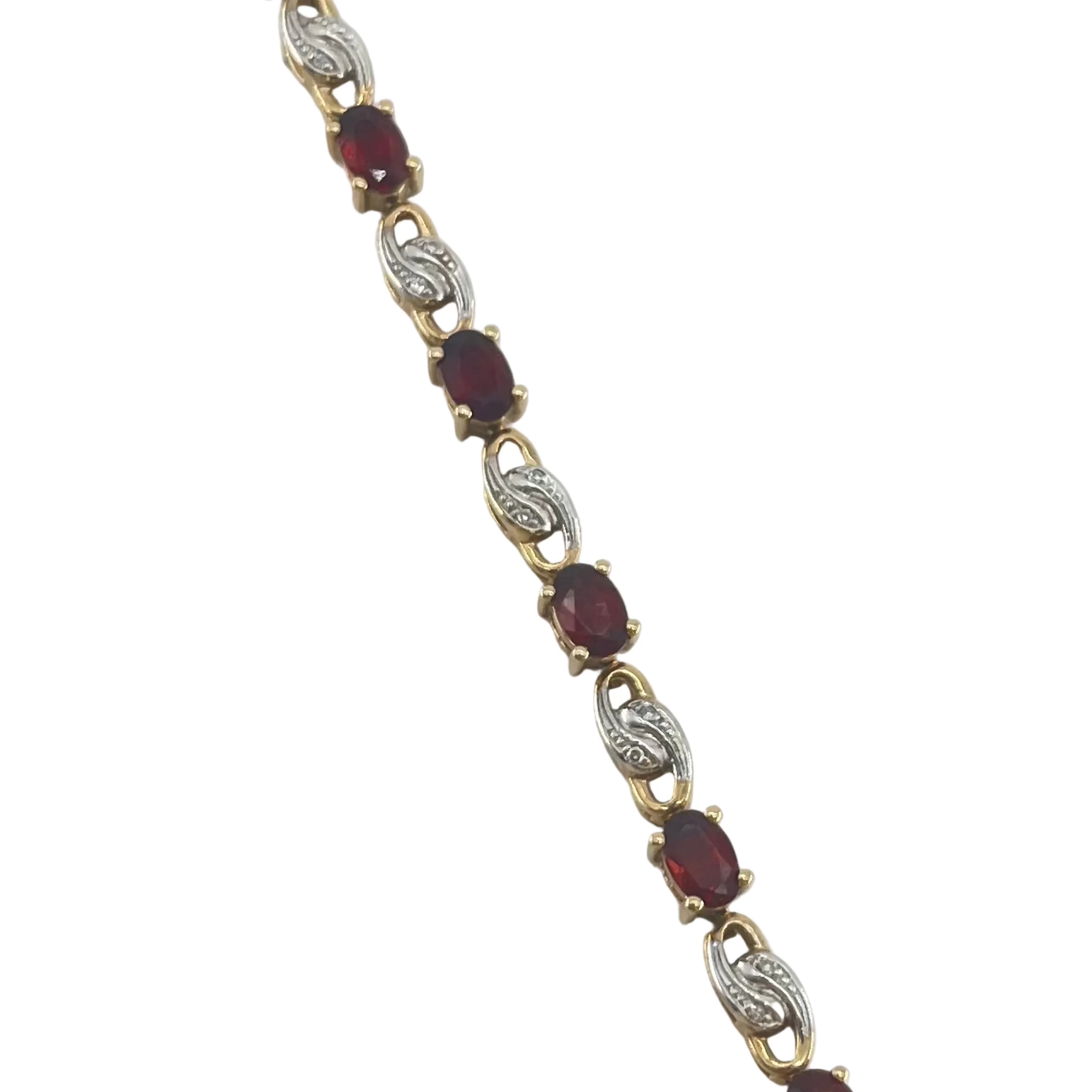 9ct Diamond & Garnet Bracelet 7.6" Carat: 9ct Gold Colour: Yellow Gold Width: 3mm Length: 7.6" Stones: Diamond & Garnets