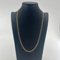 CB Stores 9ct flat curb chain displayed on a black bust stand, set against a plain white background.
