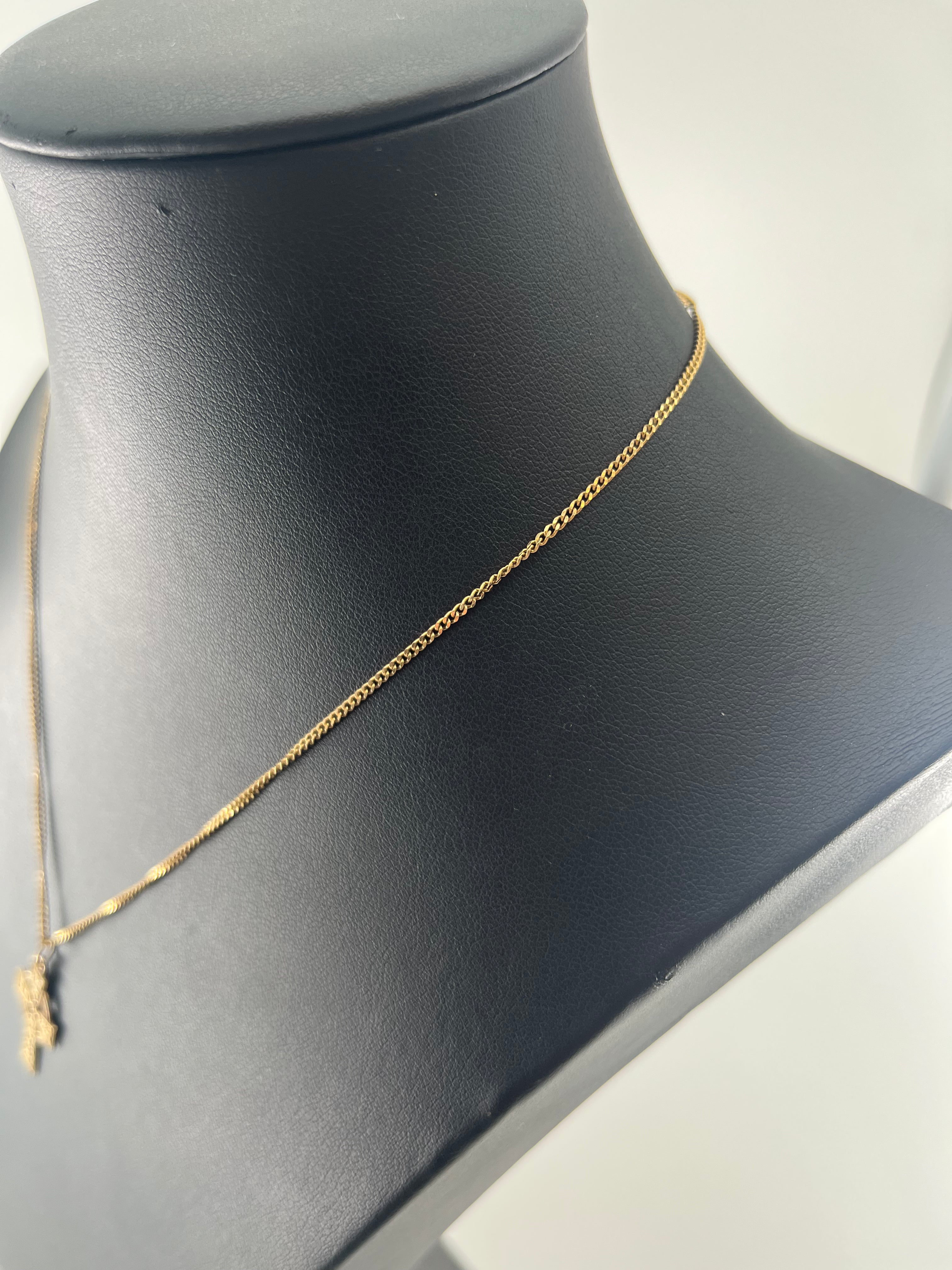 9ct Gold Celtic Cross Pendent and Curb Chain Carat: 9ct Colour: Yellow Gold Style: Curb Length: 17" Chain Width: 1mm Pendent