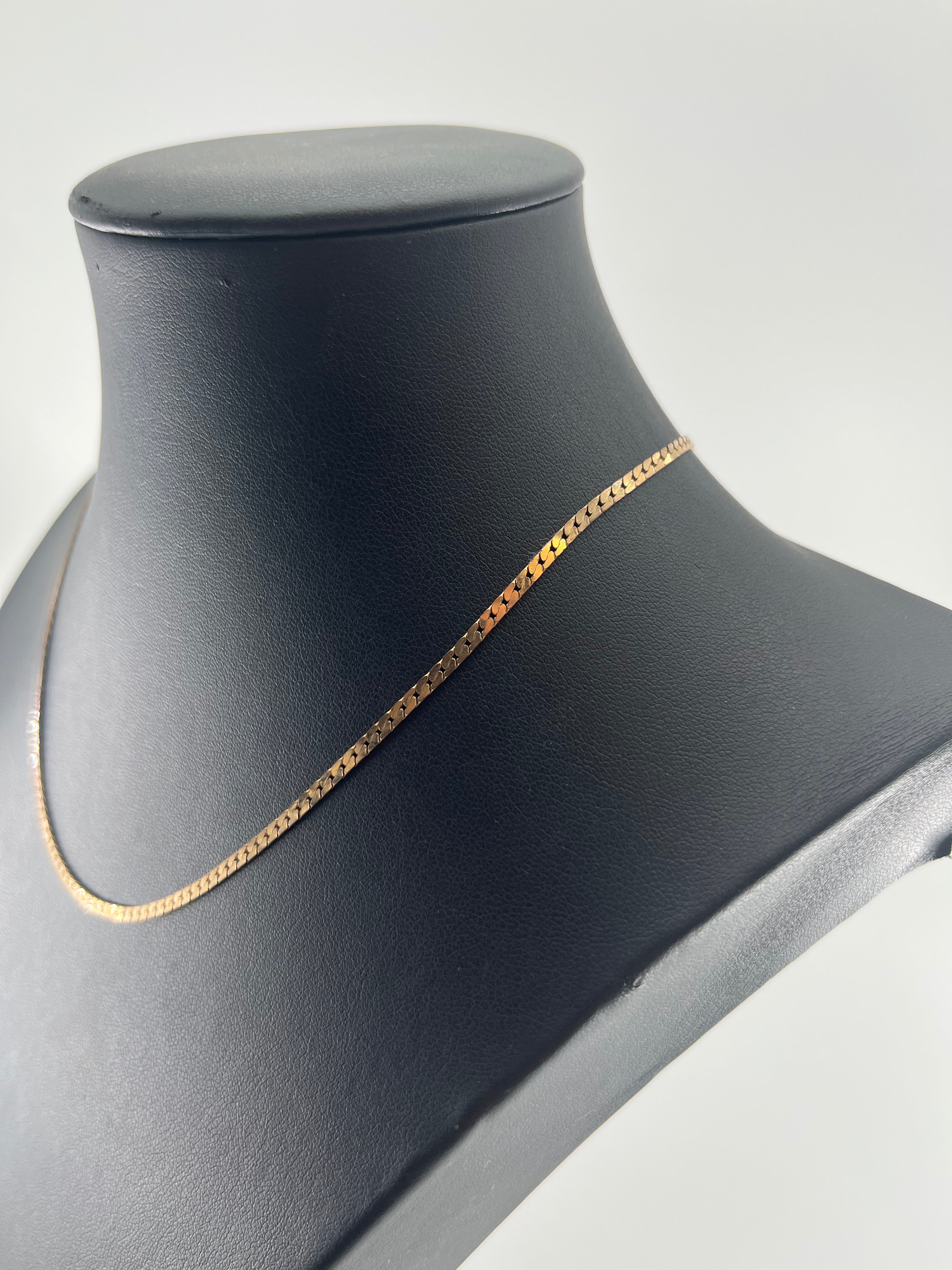 9ct Gold Flat Curb Chain Carat: 9ct Colour: Yellow Gold Style: Flat Curb Length: 16" Width: 2mm Weight: 4.98g