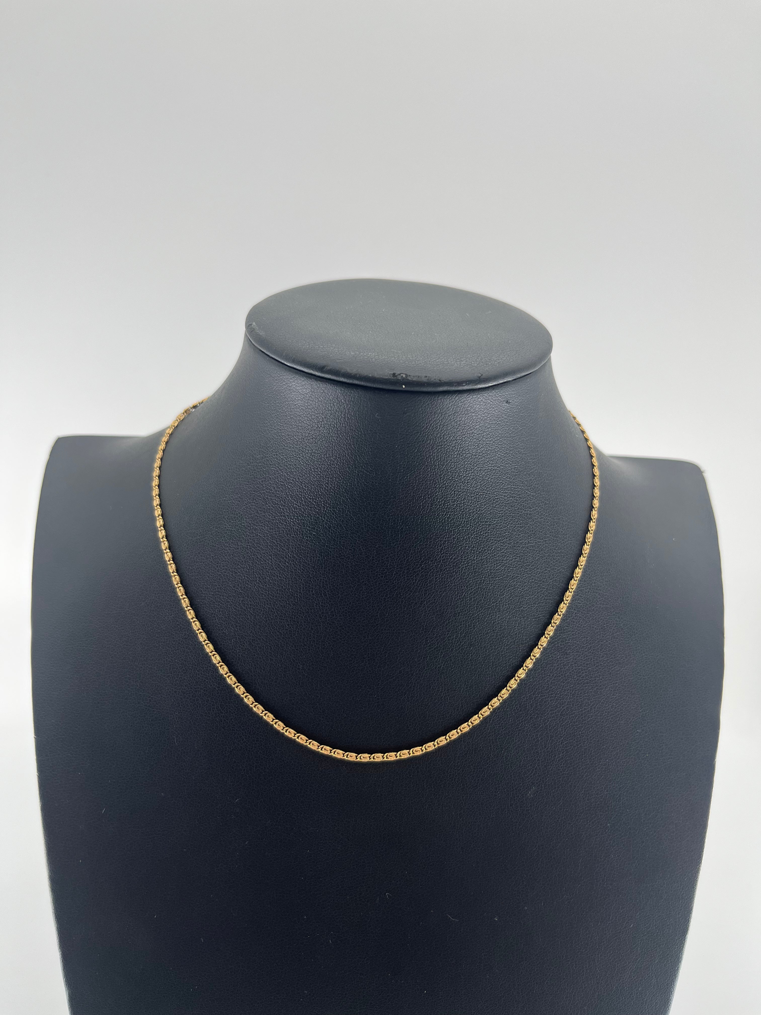 9ct Gold S-Link Curb Chain 15" Carat: 9ct Colour: Yellow Gold Style: S-Link Length: 15" Width: 1mm Weight: 3.43g