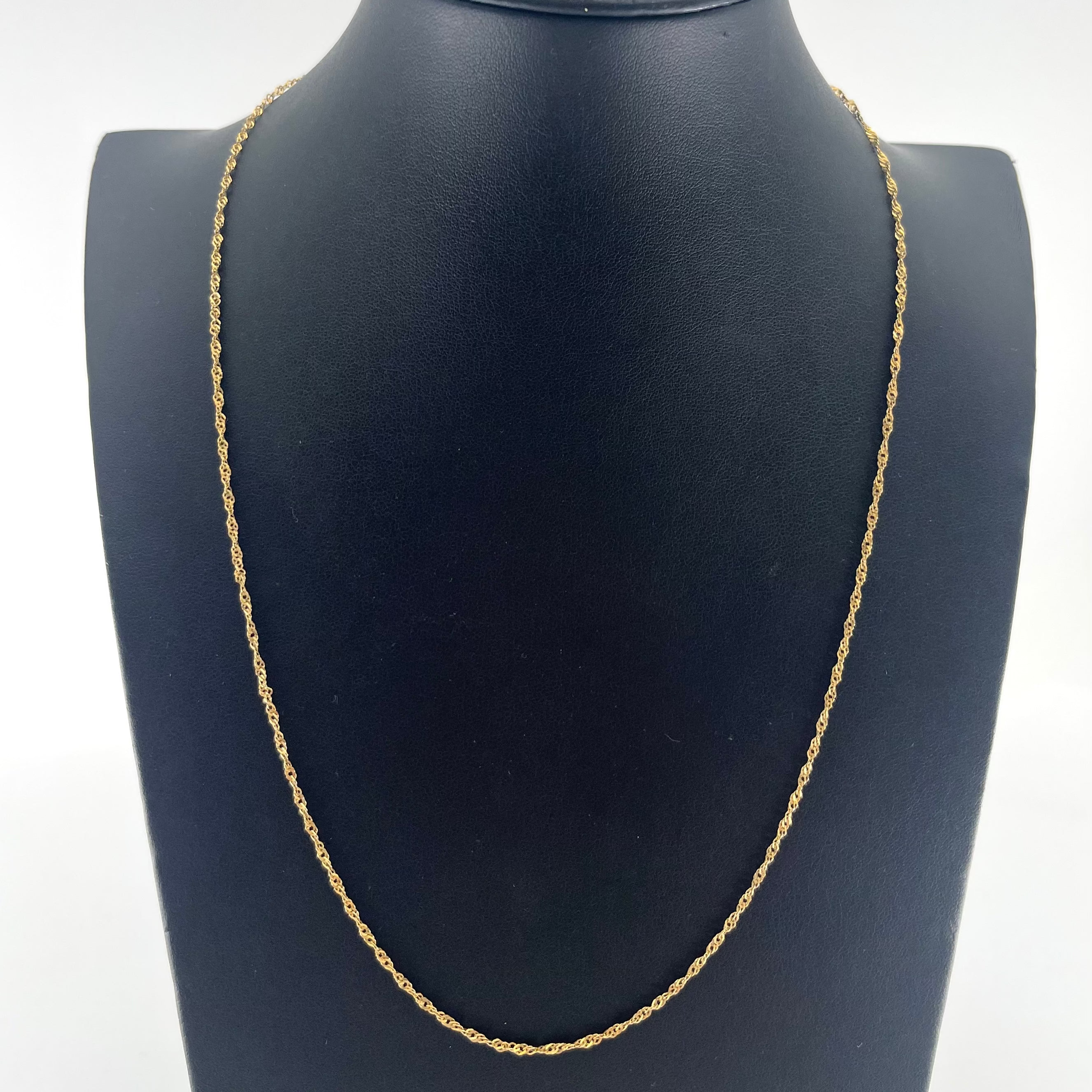 9ct Gold Twist Chain Carat: 9ct Colour: Yellow Gold Style: Twist Length: 22" Width: 1mm Weight: 1.97g