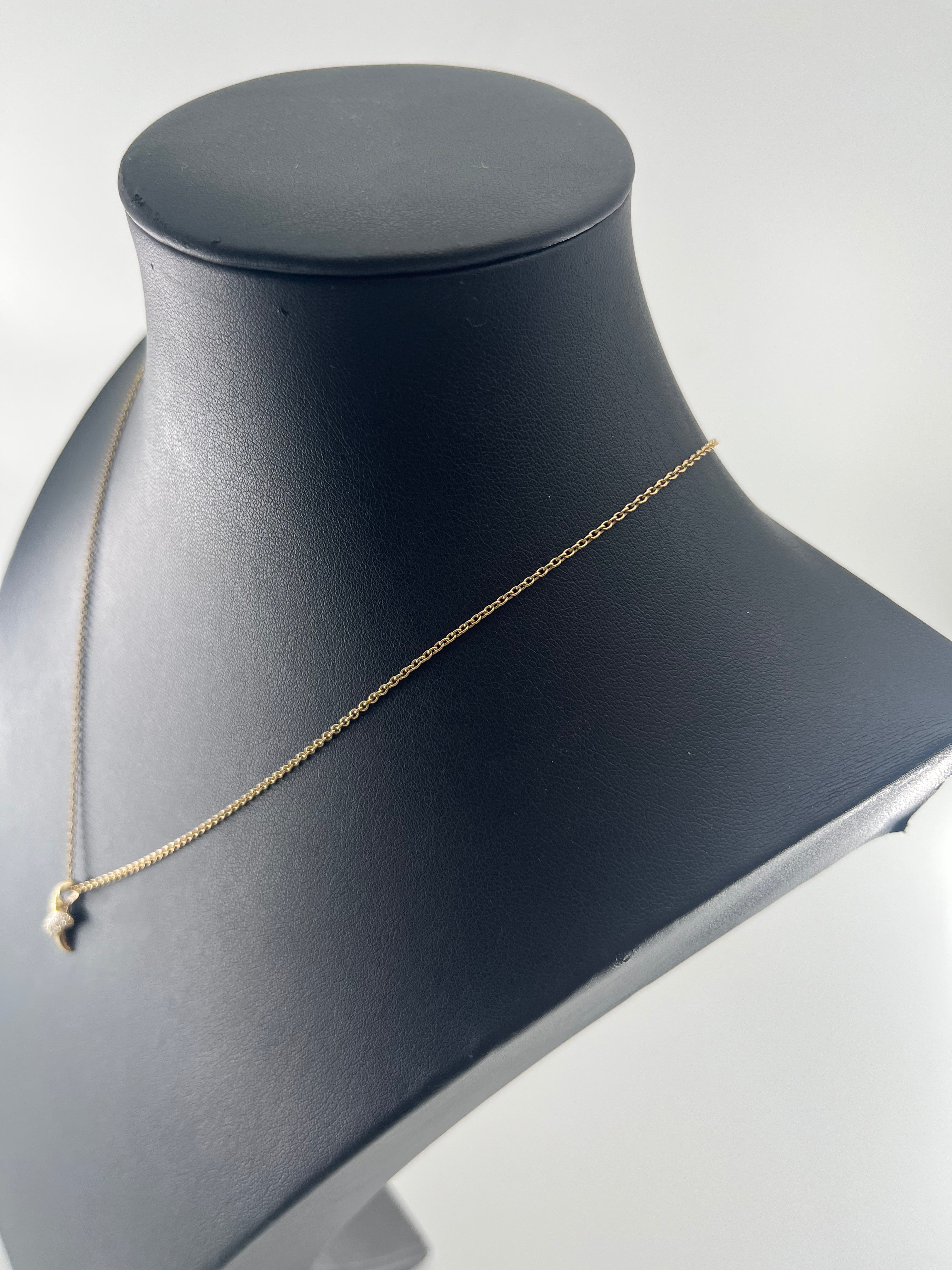 9ct Gold 'X' Pendent & Belcher Chain 18" Carat: 9ct Colour: Yellow Gold Chain Style: Belcher Pendent Style: "X" with small