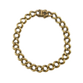 9ct Old Style Curb Bracelet 9.6" Carat: 9ct Gold Colour: Yellow Gold Width: 7mm Length: 9.6" Weight: 45.27g