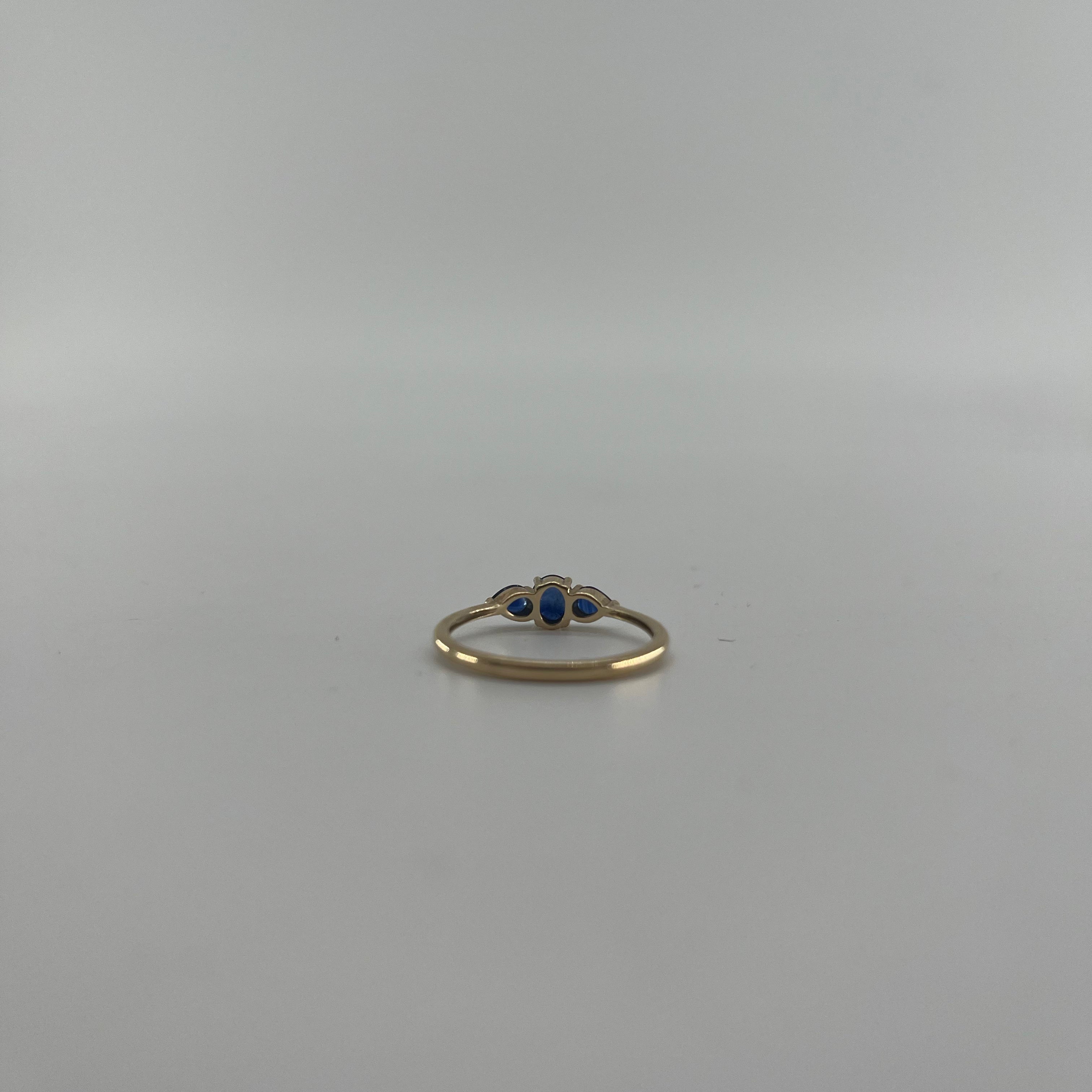 9ct Three Stone Sapphire Ring Carat: 9ct Gold Colour: Yellow Gold Size: Q Stones: Sapphire Weight: 1.6g