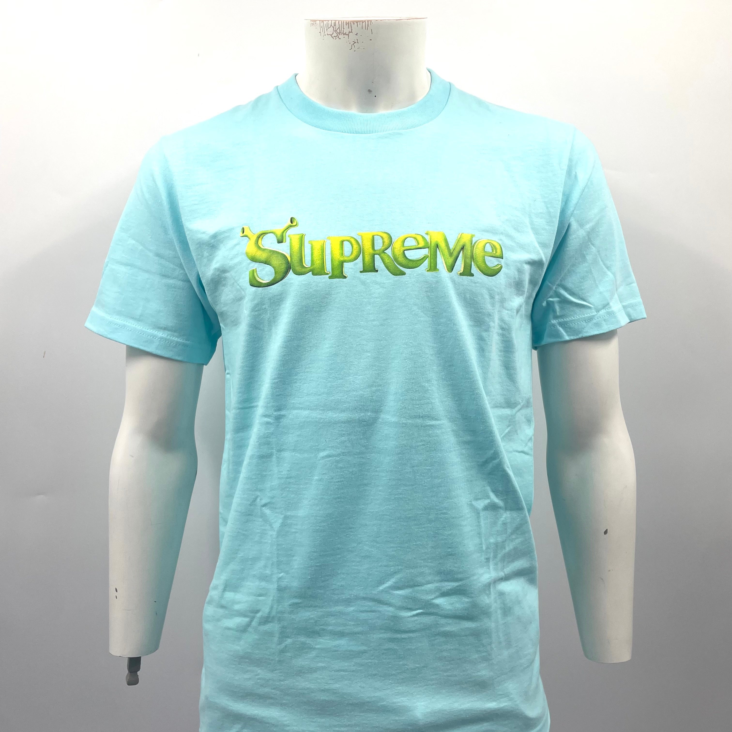 Supreme Tee — Light Blue with Green/Yellow Logo