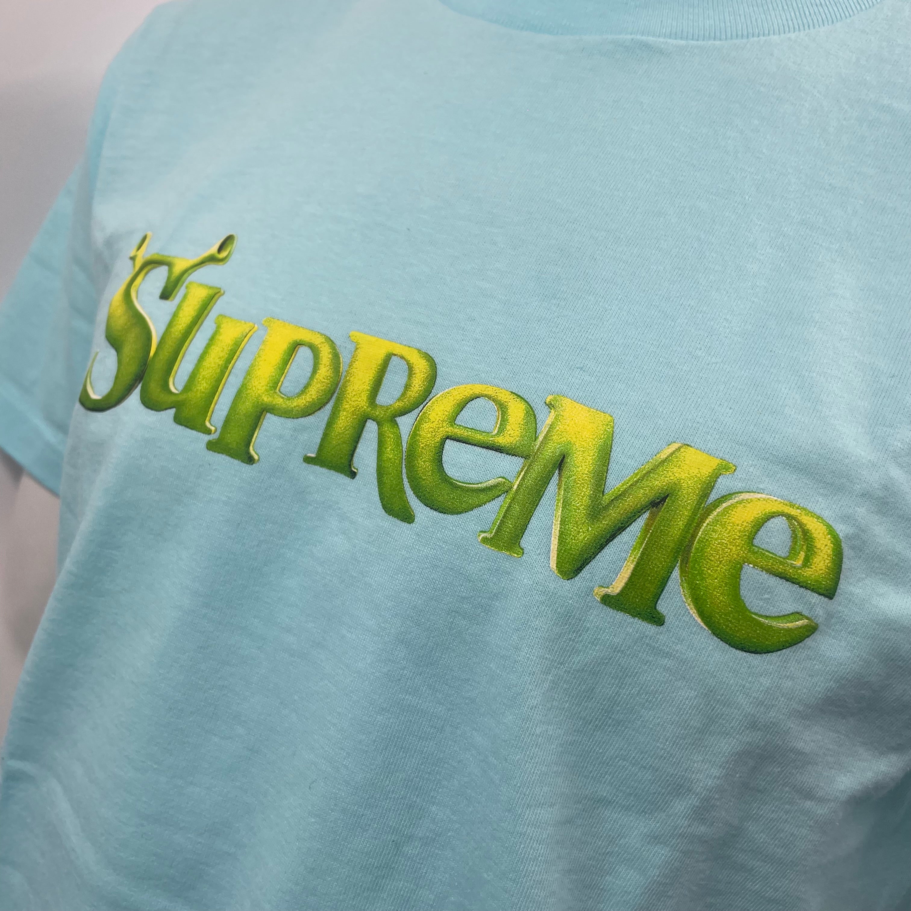 Supreme Tee — Light Blue with Green/Yellow Logo