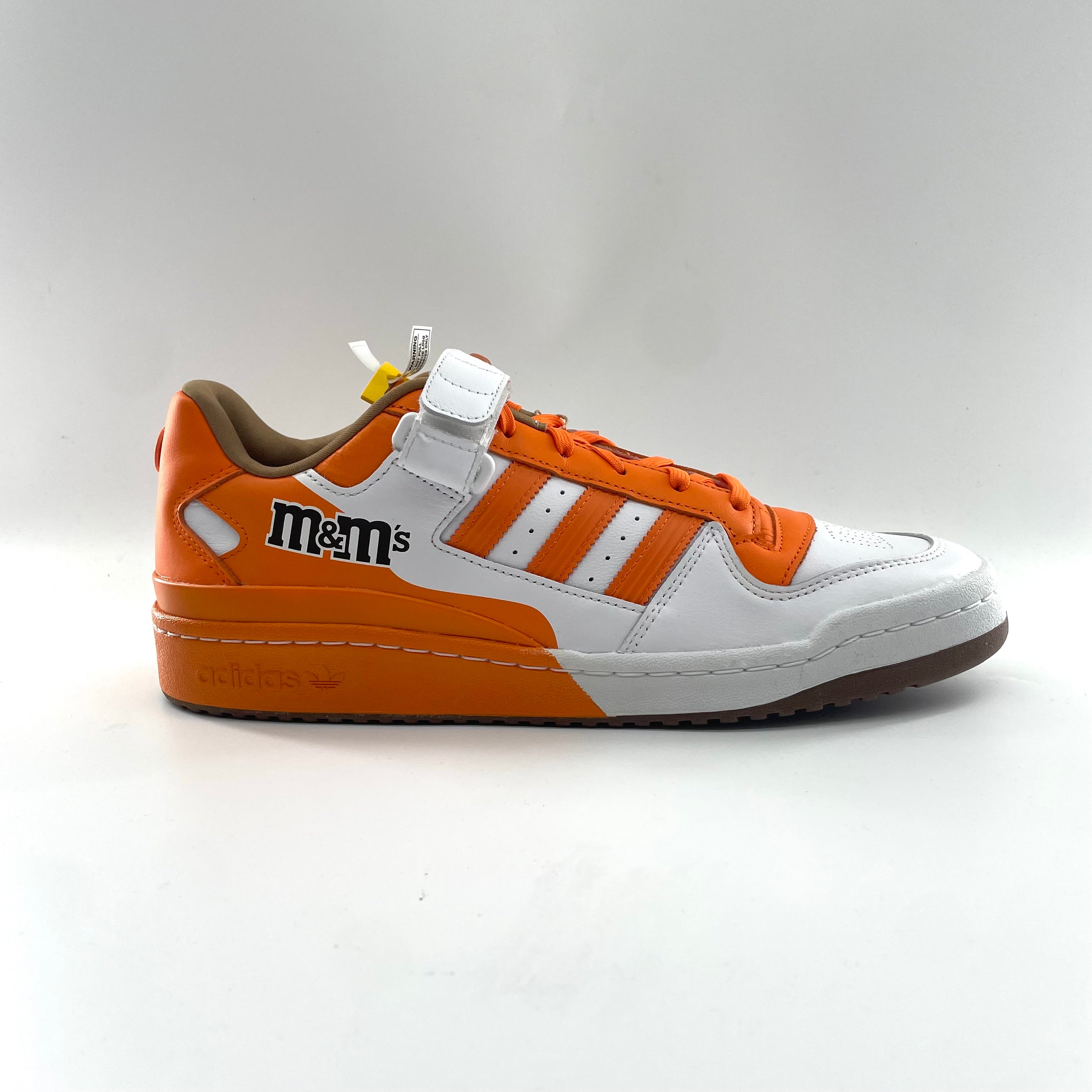 The Adidas Forum Lo 84 M&Ms Crew V1 is a playful collaboration based on the classic Forum Low 84 silhouette, featuring