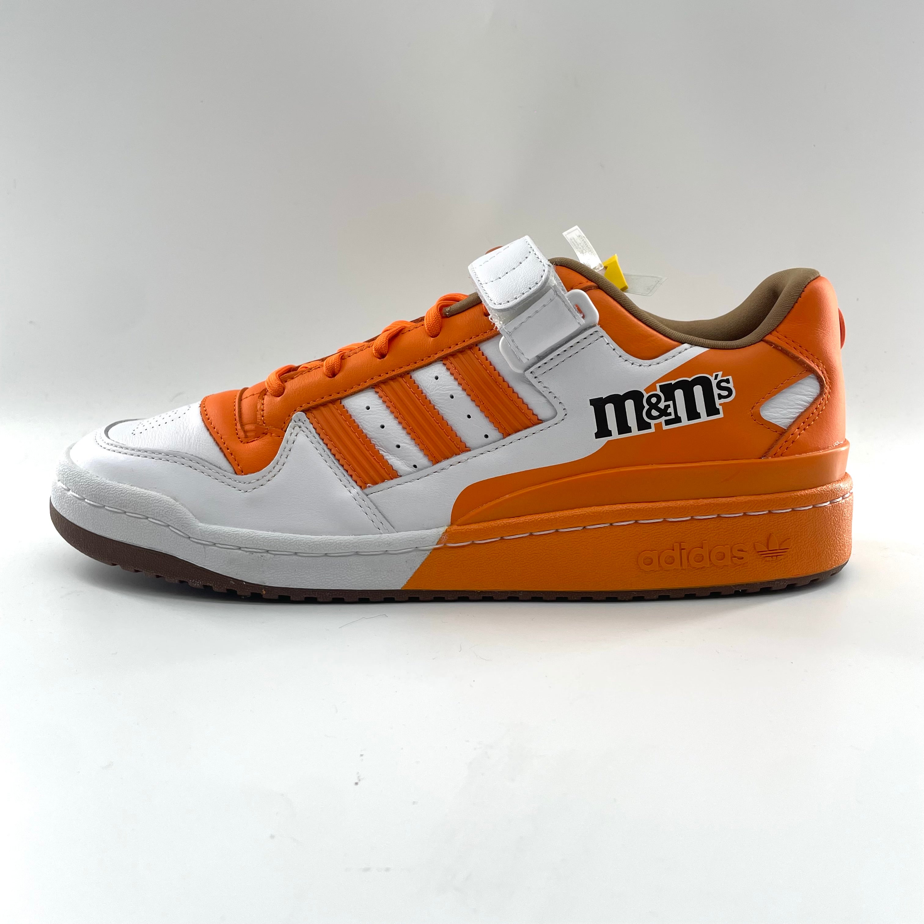 The Adidas Forum Lo 84 M&Ms Crew V1 is a playful collaboration based on the classic Forum Low 84 silhouette, featuring