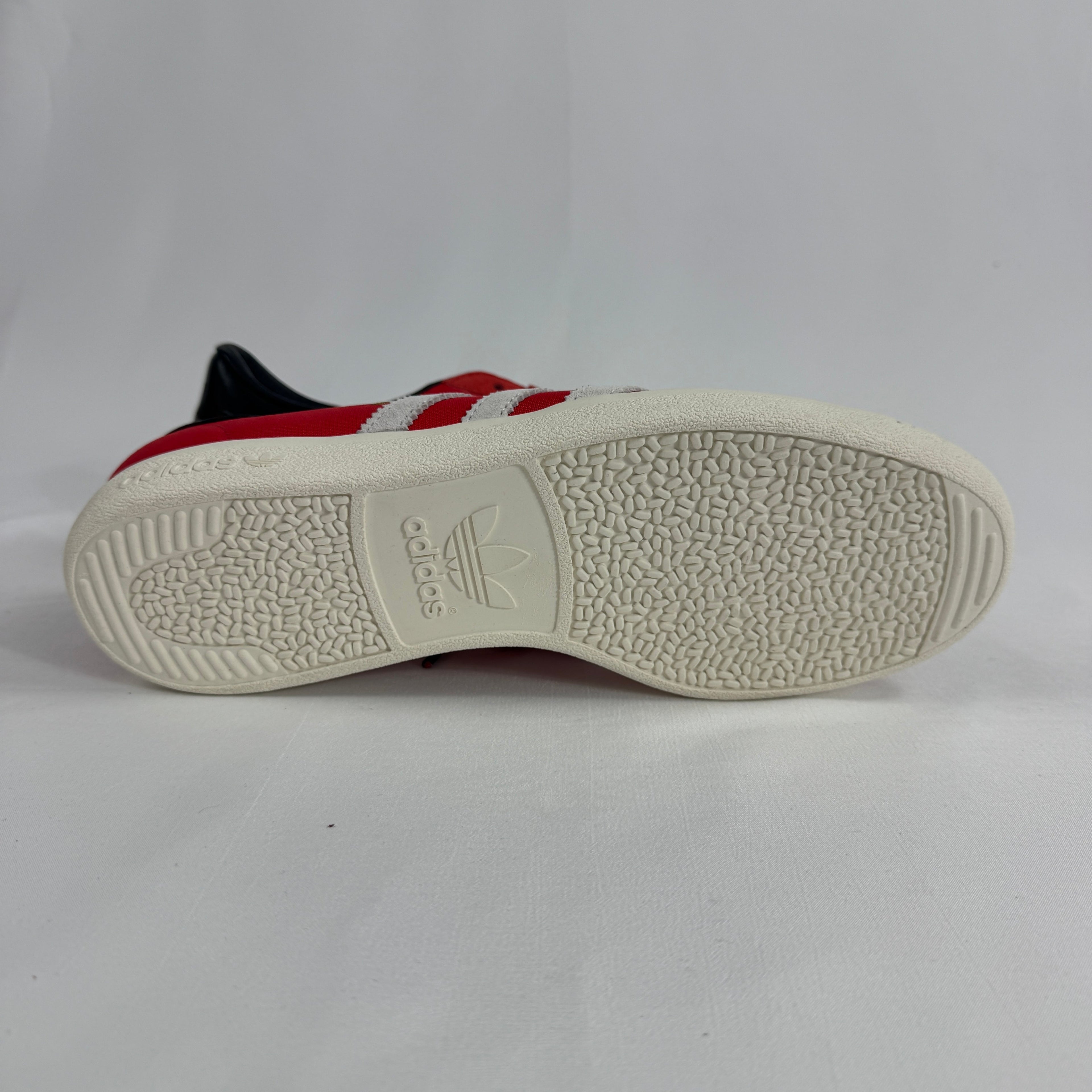 The Adidas Madrid Gary Neville Signed is a rare football boot associated with Gary Neville, featuring a classic Adidas