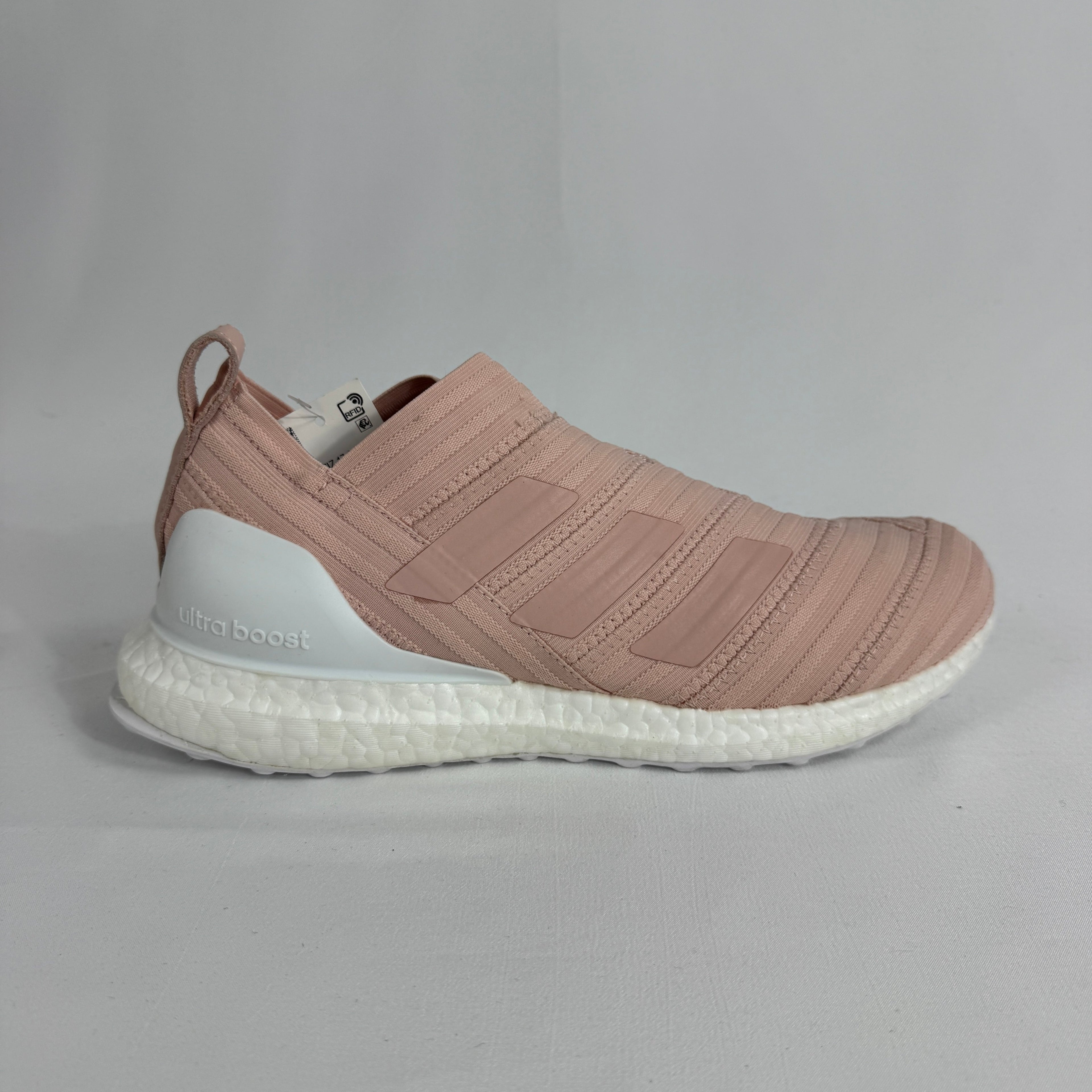 The Adidas Nemeziz Tango 17 Ultra Boost Kith Flamingo is a limited-edition sneaker that blends football-inspired design with