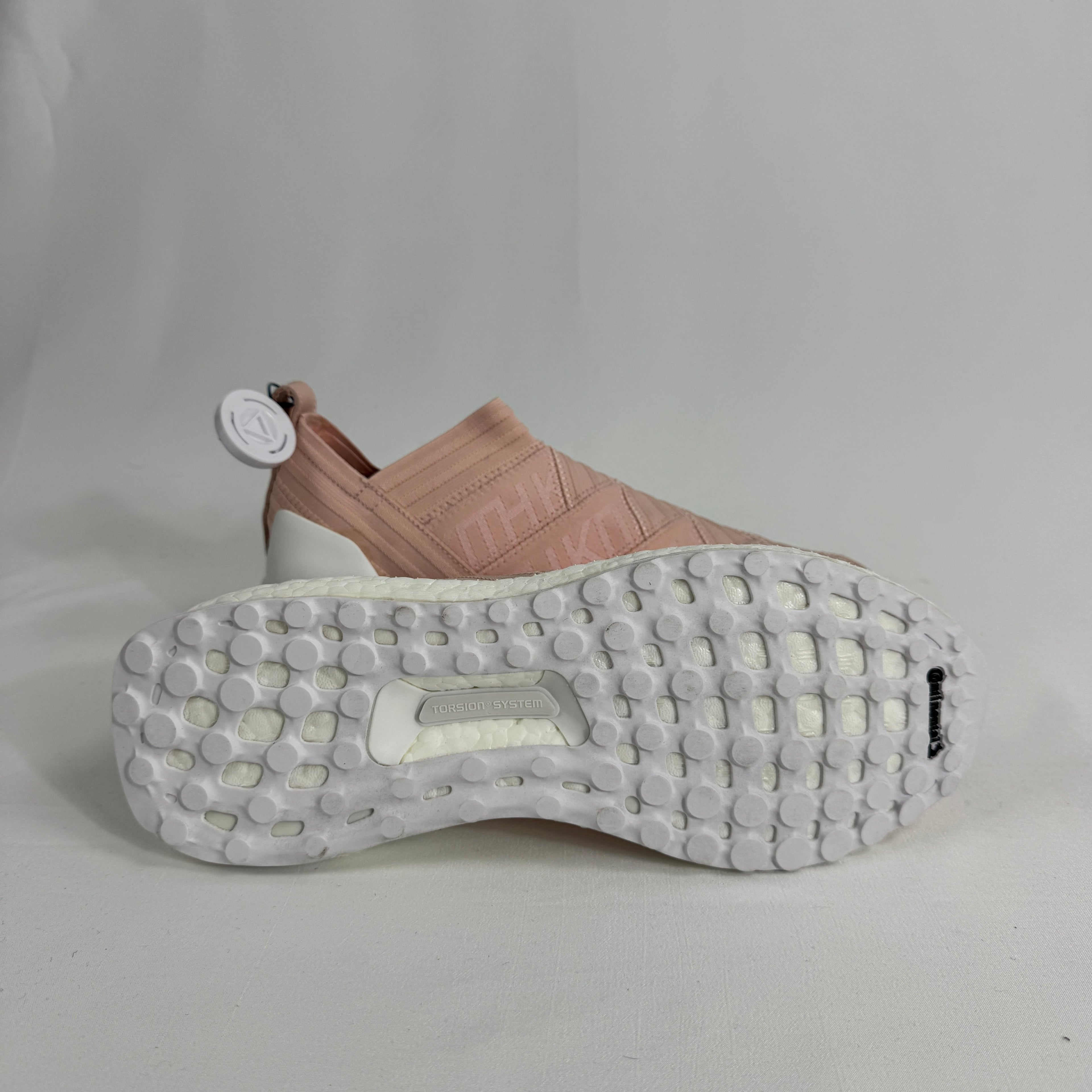 The Adidas Nemeziz Tango 17 Ultra Boost Kith Flamingo is a limited-edition sneaker that blends football-inspired design with