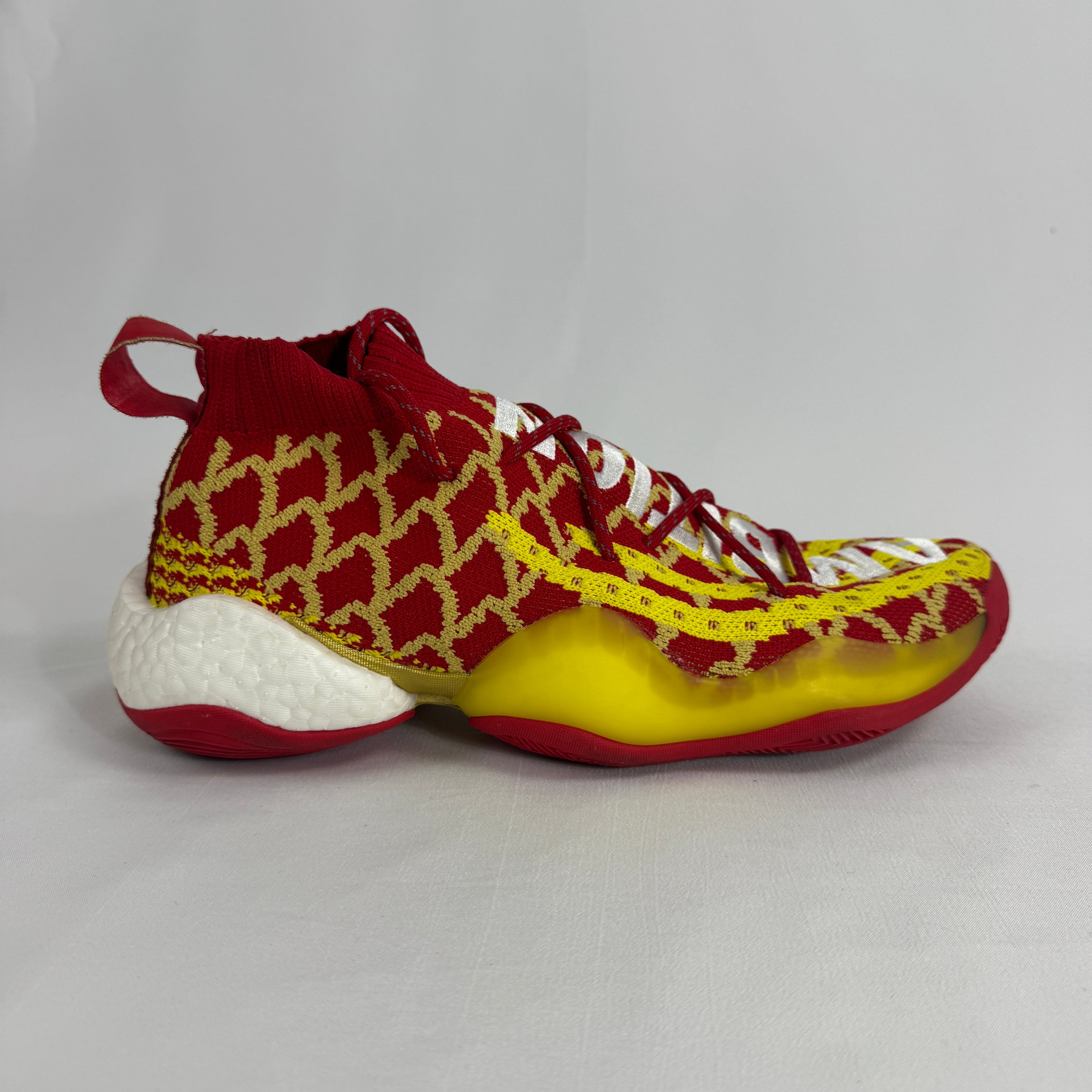 The Adidas PW x BYW CNY is a special edition sneaker designed by Pharrell Williams to celebrate the Chinese New Year. It