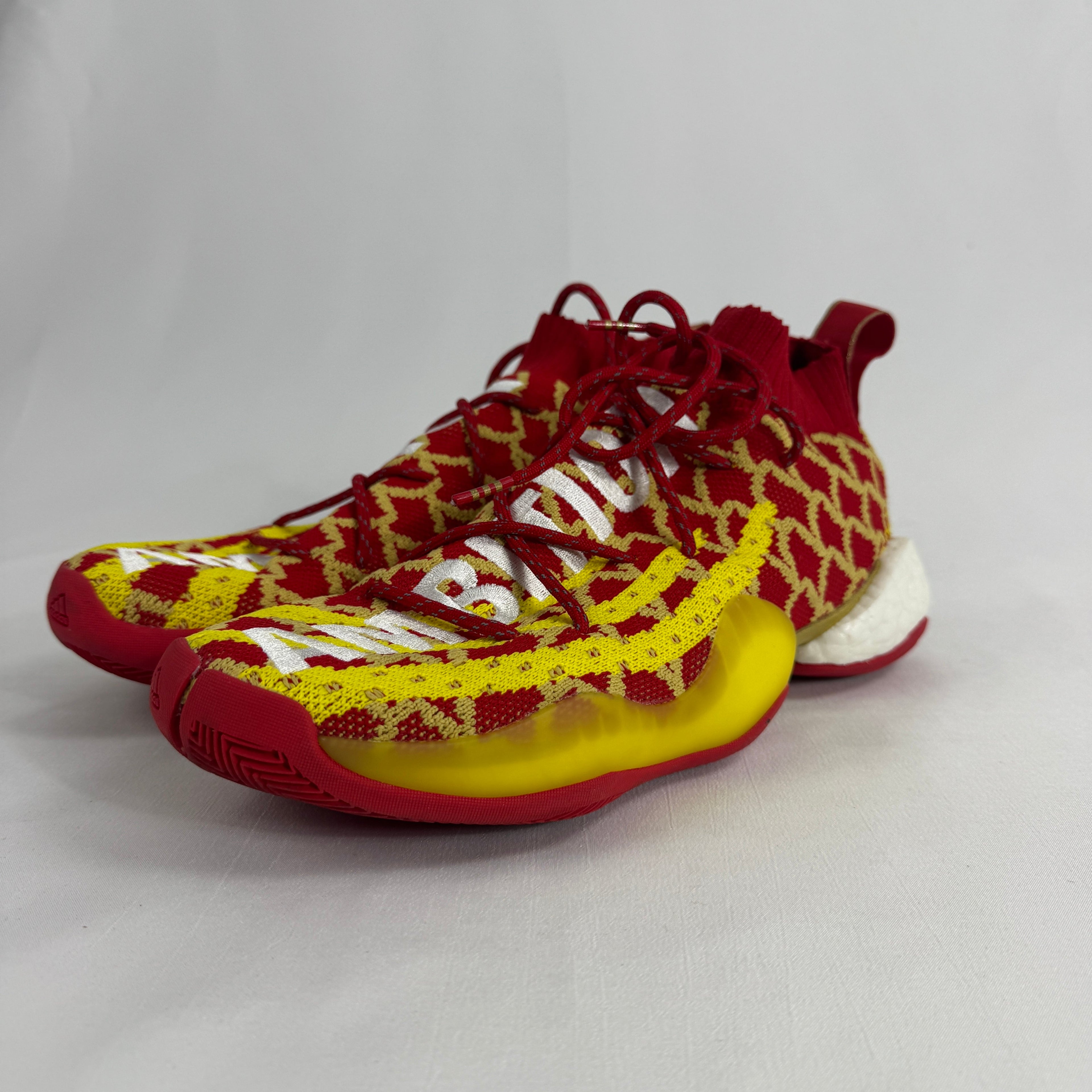 The Adidas PW x BYW CNY is a special edition sneaker designed by Pharrell Williams to celebrate the Chinese New Year. It