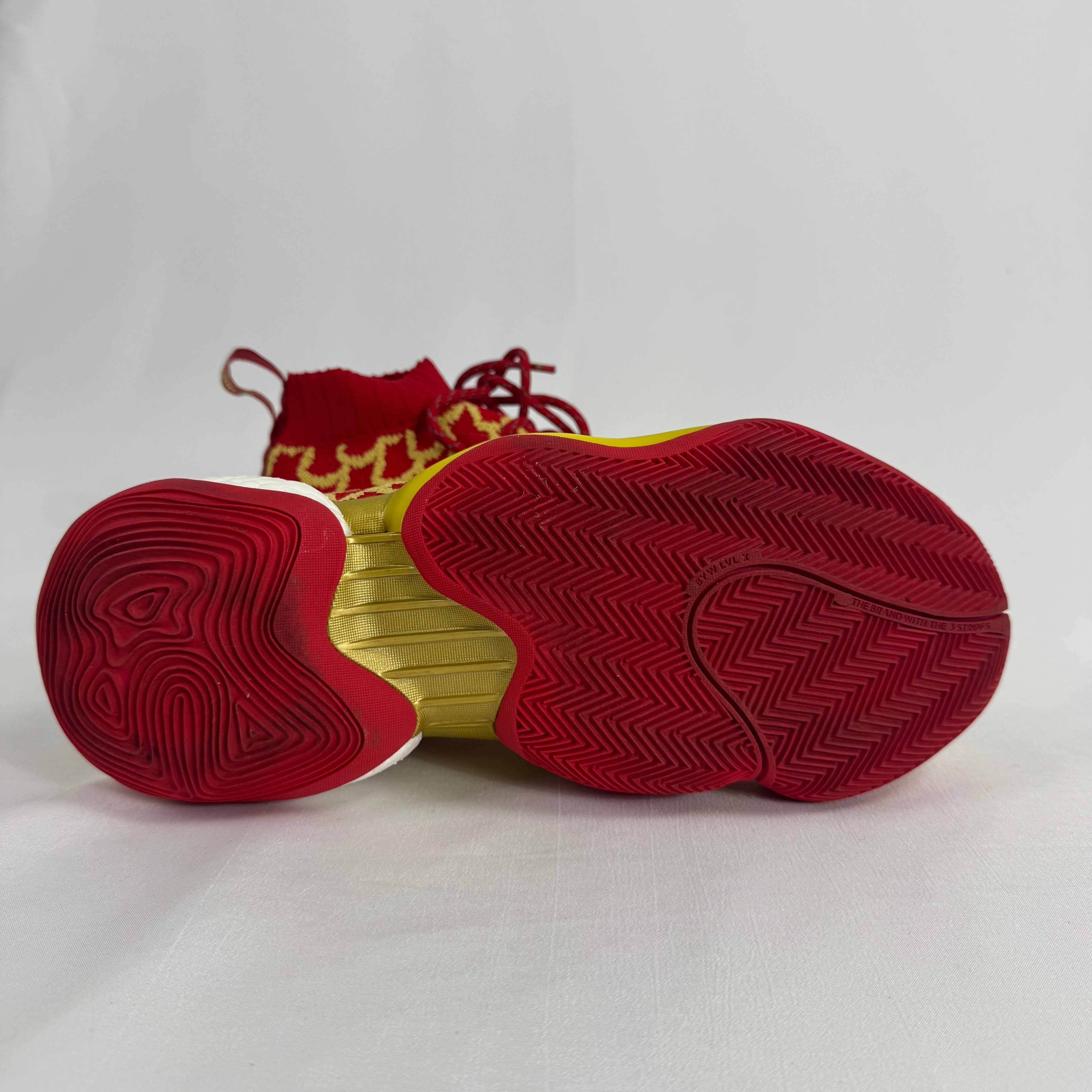 The Adidas PW x BYW CNY is a special edition sneaker designed by Pharrell Williams to celebrate the Chinese New Year. It