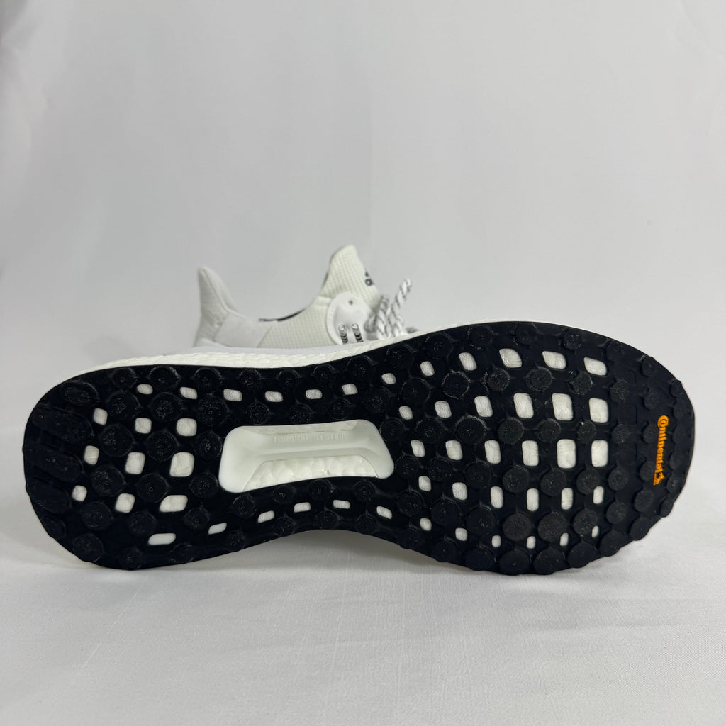 The Adidas Solar Hu Human Made is a collaborative sneaker that combines Pharrell Williams' Solar Hu silhouette with Human