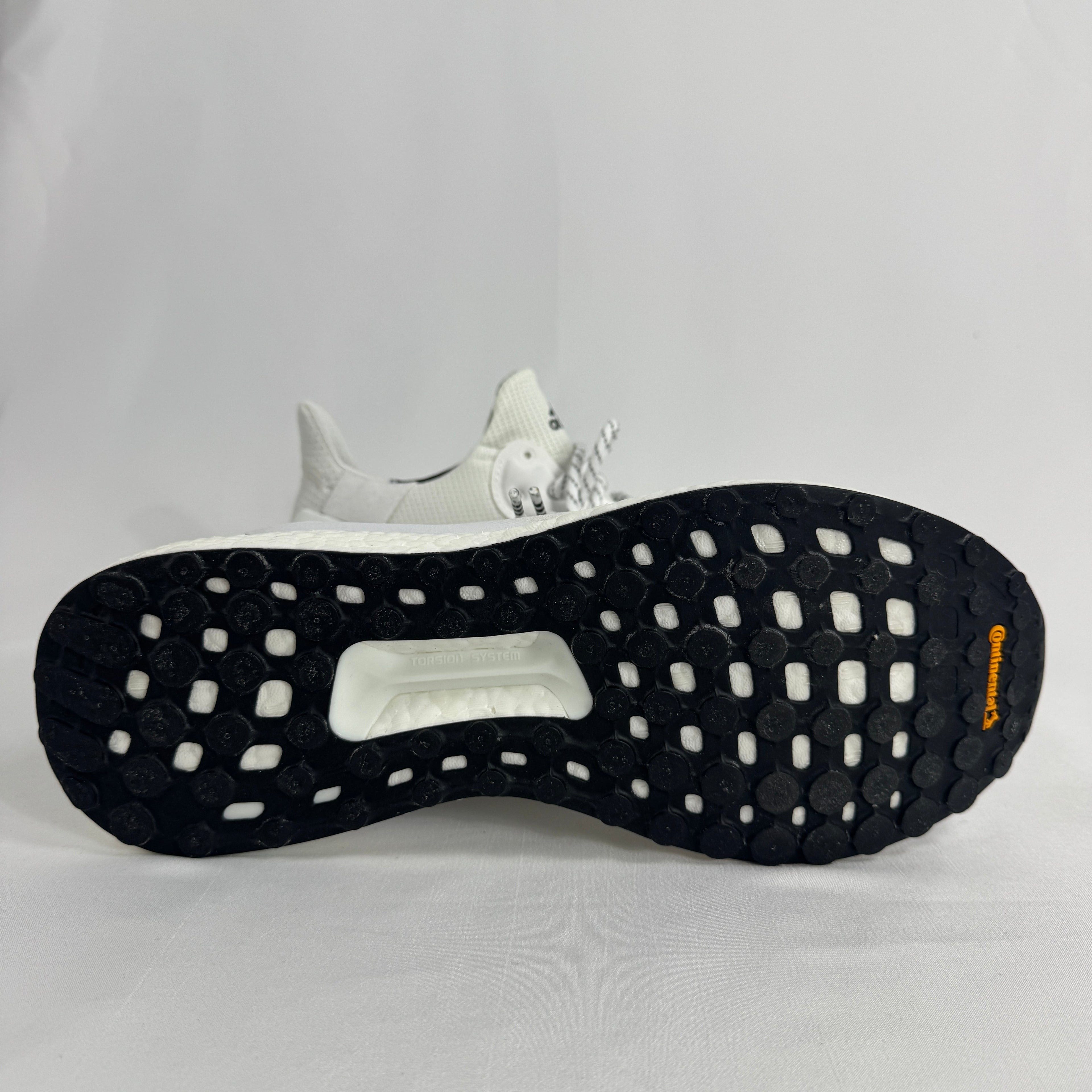 The Adidas Solar Hu Human Made is a collaborative sneaker that combines Pharrell Williams' Solar Hu silhouette with Human