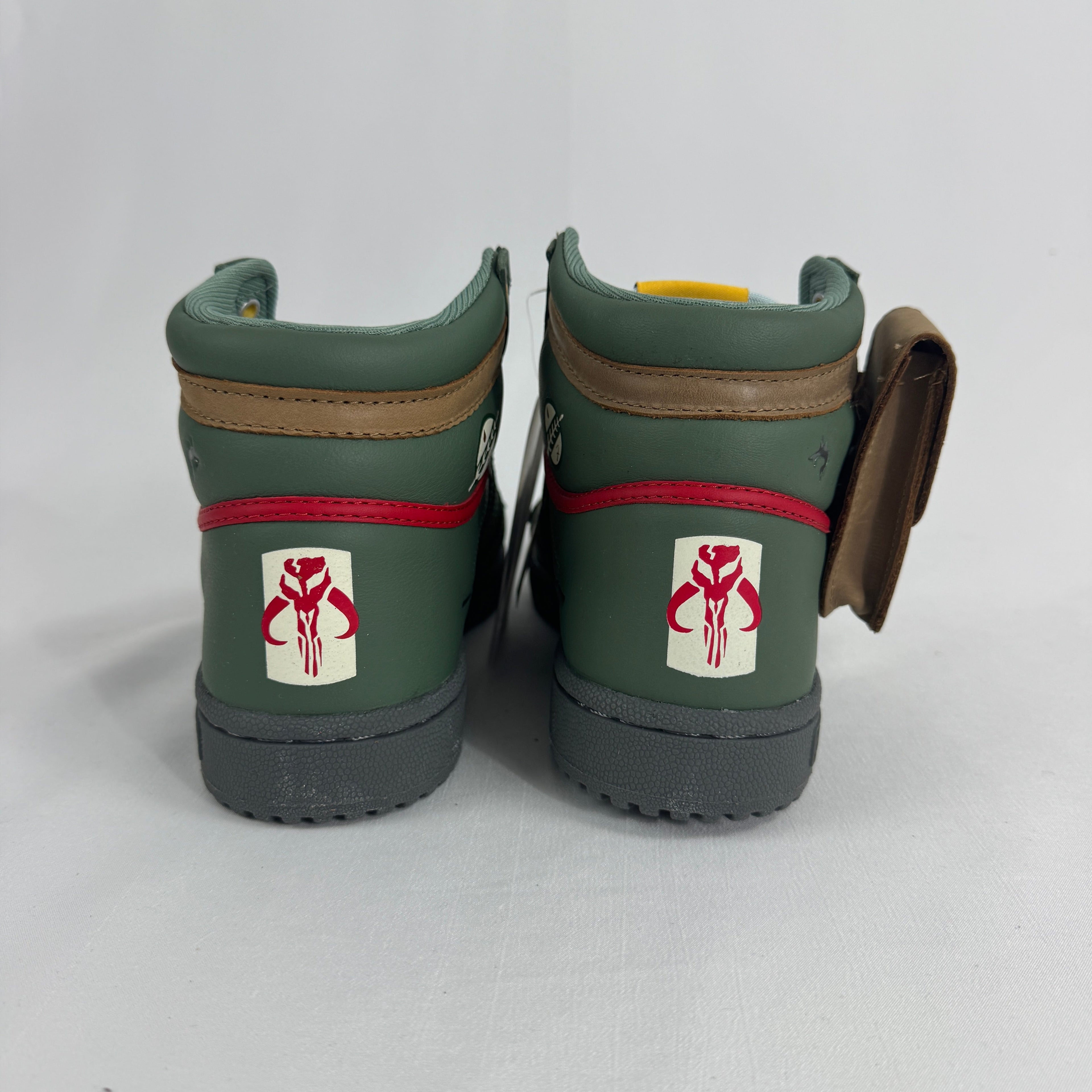 The Adidas Top Ten Hi Star Wars Boba Fett is a high-top basketball-inspired sneaker themed around the Star Wars bounty