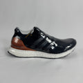 The Adidas Ultra Boost Bronze is a performance-inspired sneaker featuring a breathable Primeknit upper, responsive Boost