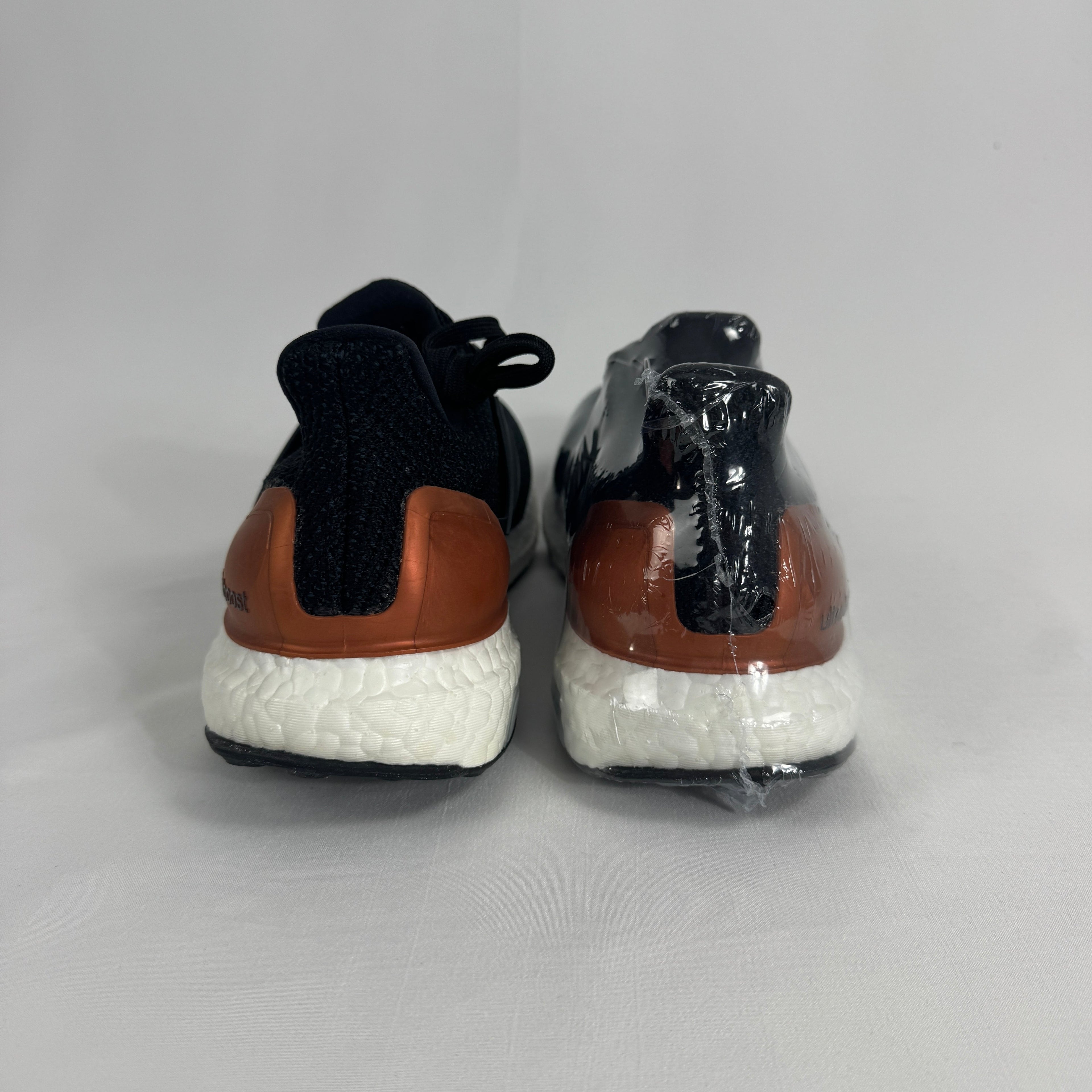 The Adidas Ultra Boost Bronze is a performance-inspired sneaker featuring a breathable Primeknit upper, responsive Boost