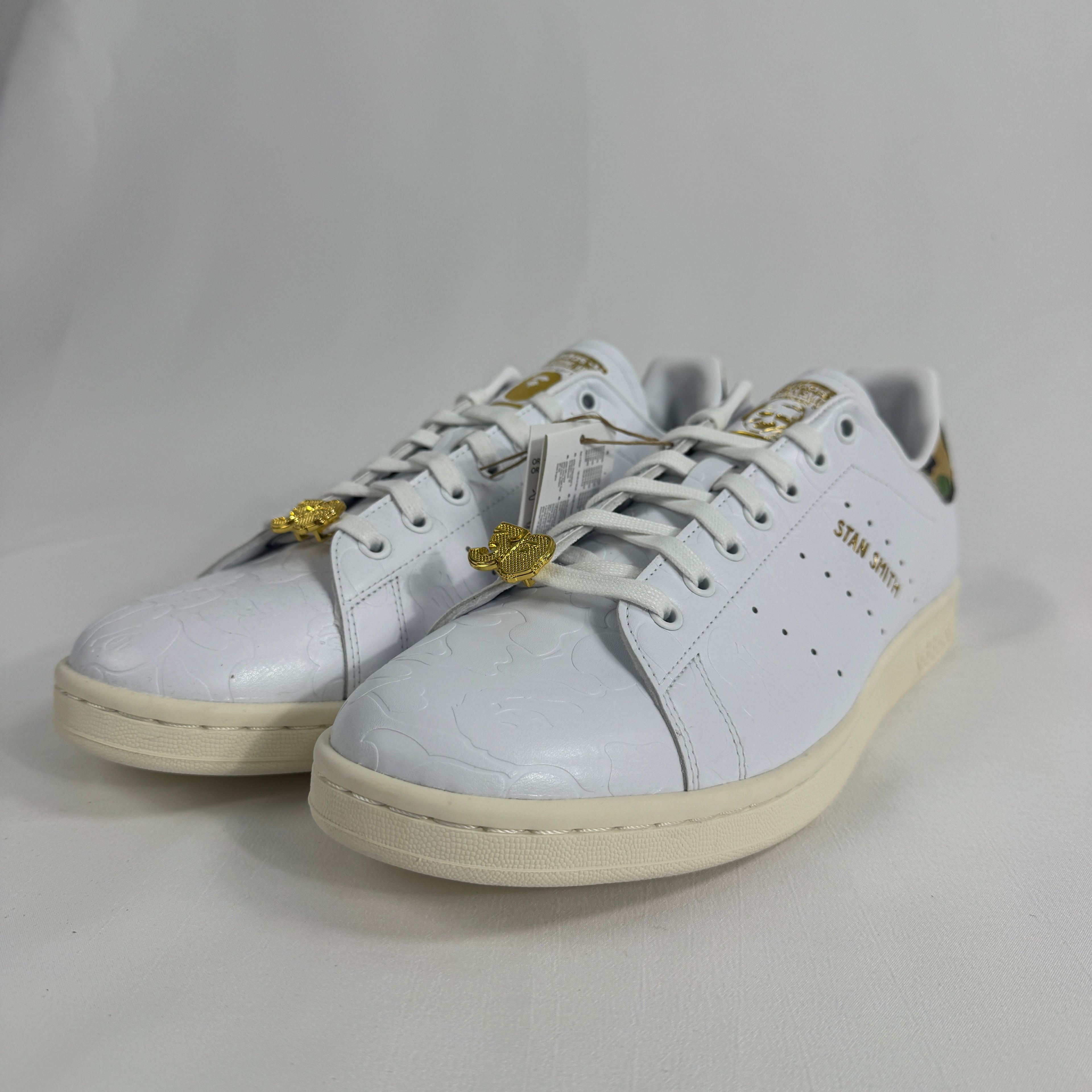 The Adidas x Bape Stan Smith is a collaborative sneaker that blends the classic Stan Smith silhouette with BAPE's signature