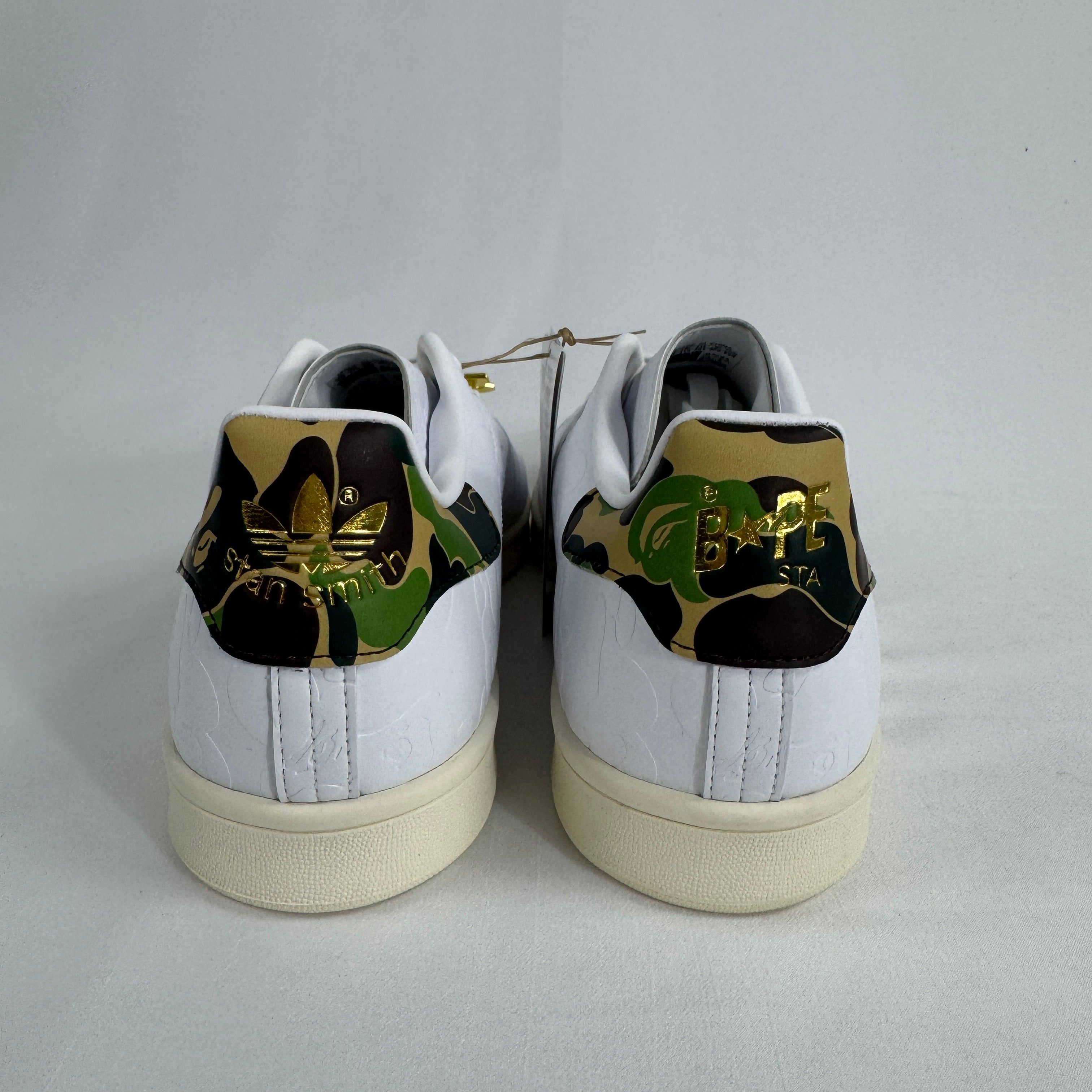 The Adidas x Bape Stan Smith is a collaborative sneaker that blends the classic Stan Smith silhouette with BAPE's signature