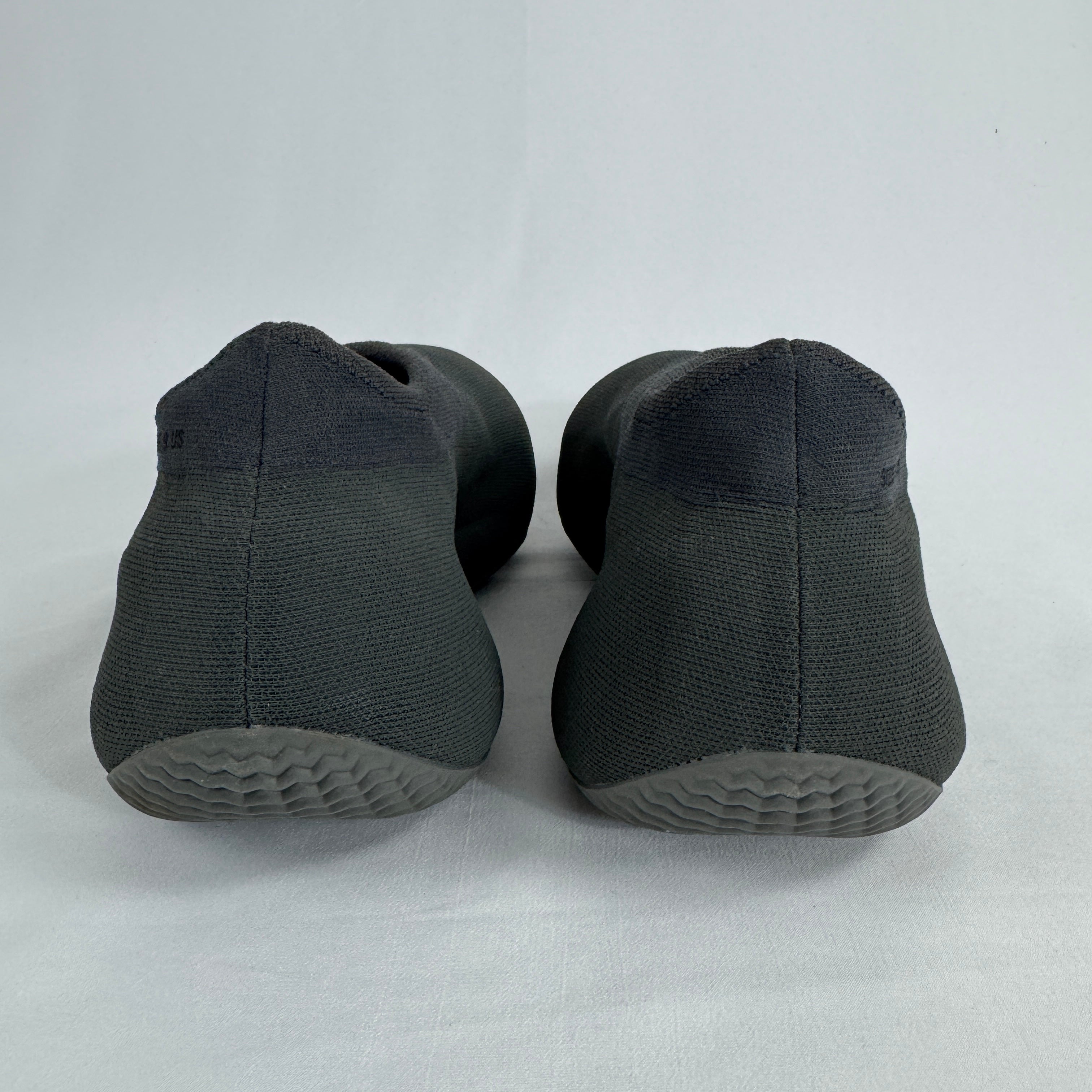 The Adidas Yeezy Knit RNR is a slip-on sneaker featuring a fully knitted one-piece upper with a sock-like fit and a sculpted