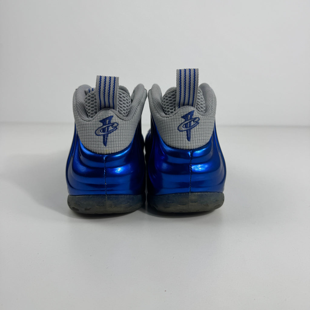 Air Foamposite One is a bold, futuristic sneaker known for its molded Foamposite upper, exceptional durability, and