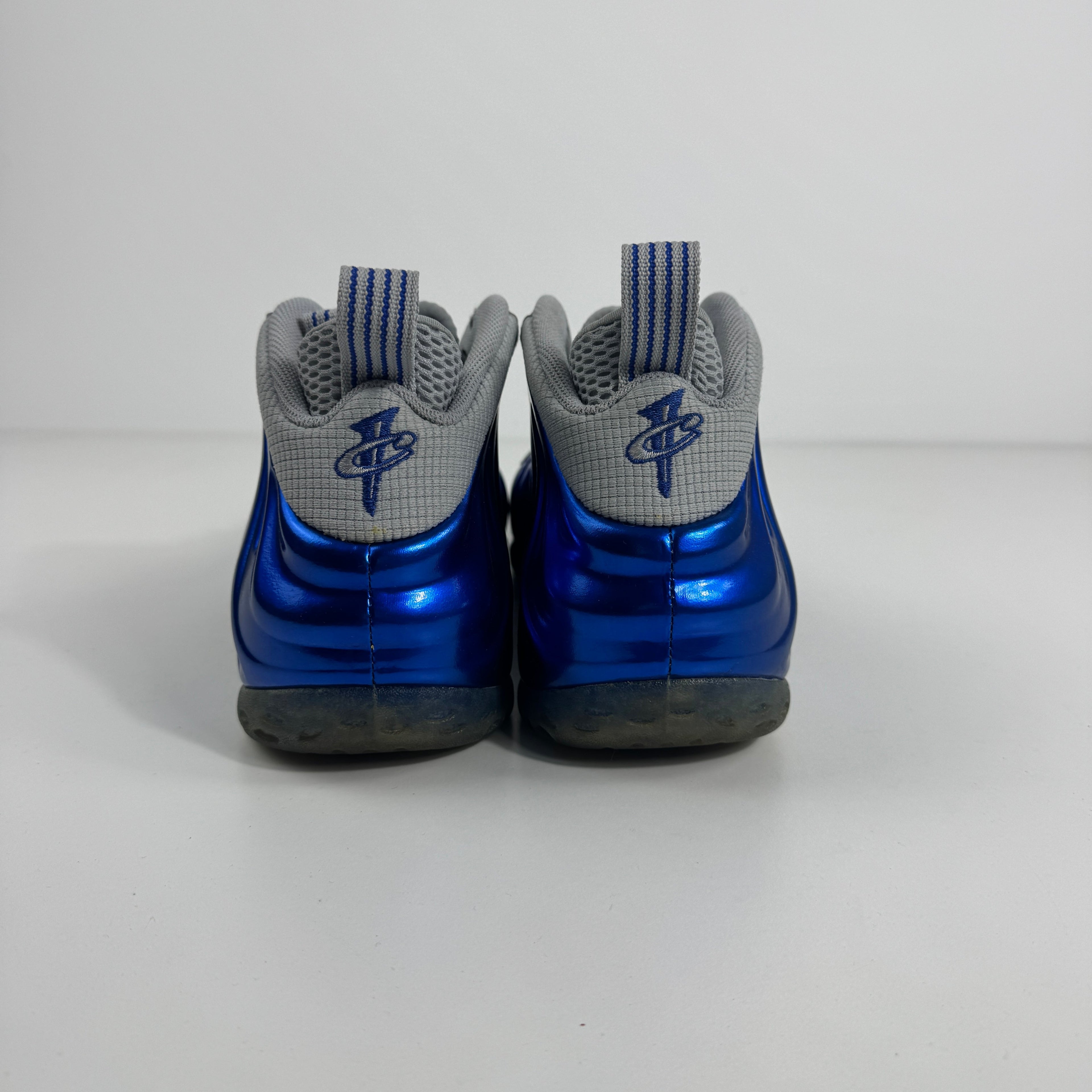 Air Foamposite One is a bold, futuristic sneaker known for its molded Foamposite upper, exceptional durability, and