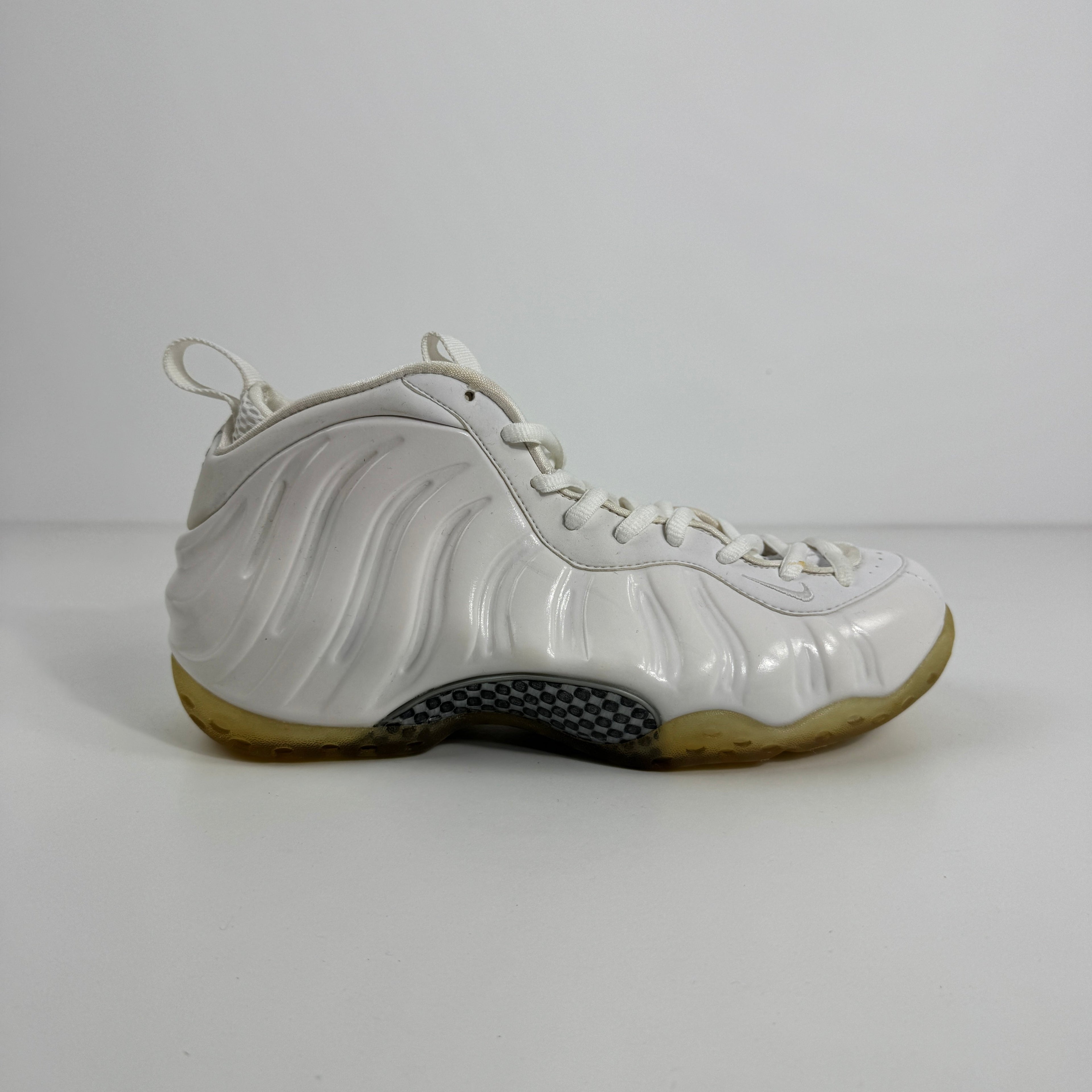 Nike Air Foamposite One is a standout basketball sneaker known for its futuristic molded Foamposite upper, durable