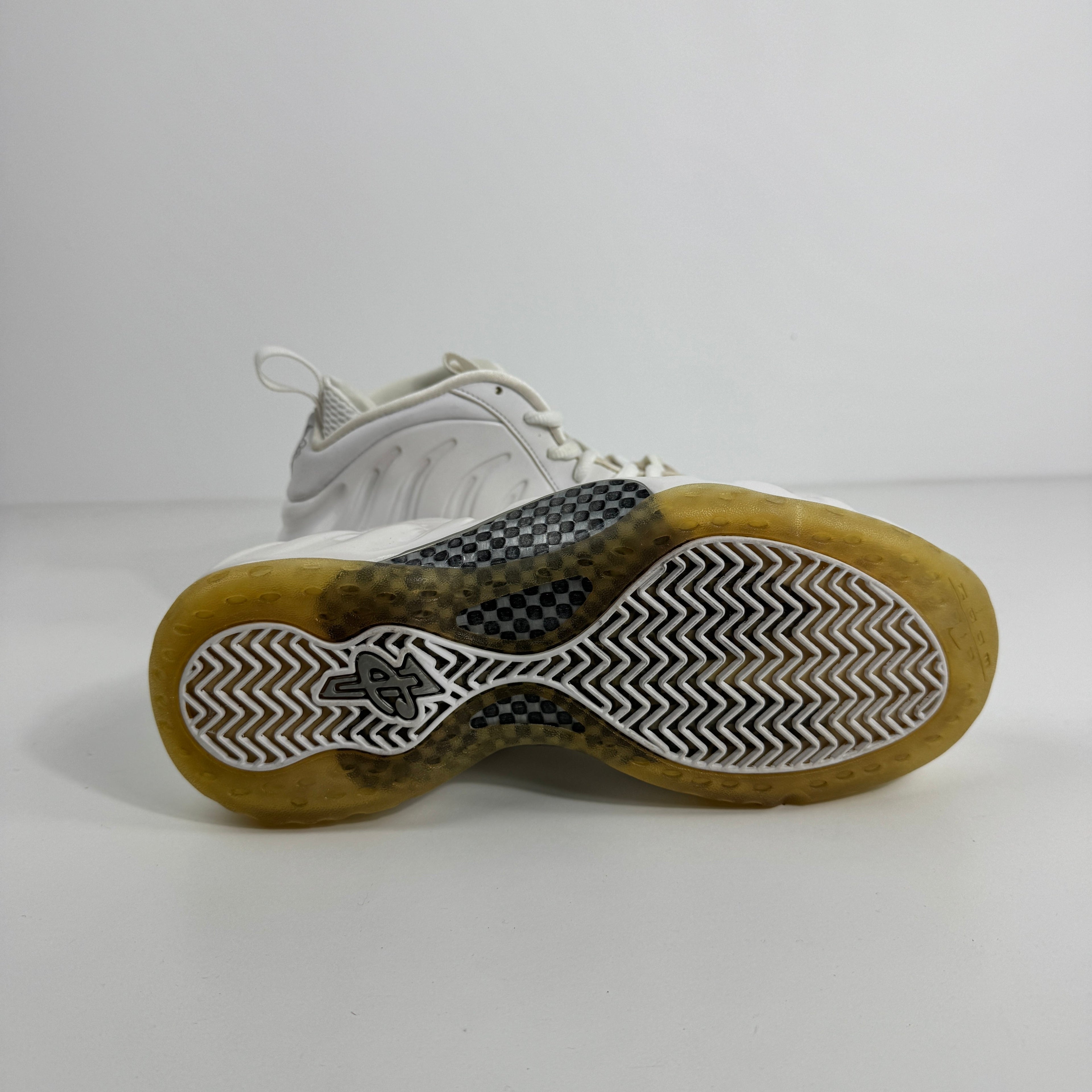 Nike Air Foamposite One is a standout basketball sneaker known for its futuristic molded Foamposite upper, durable