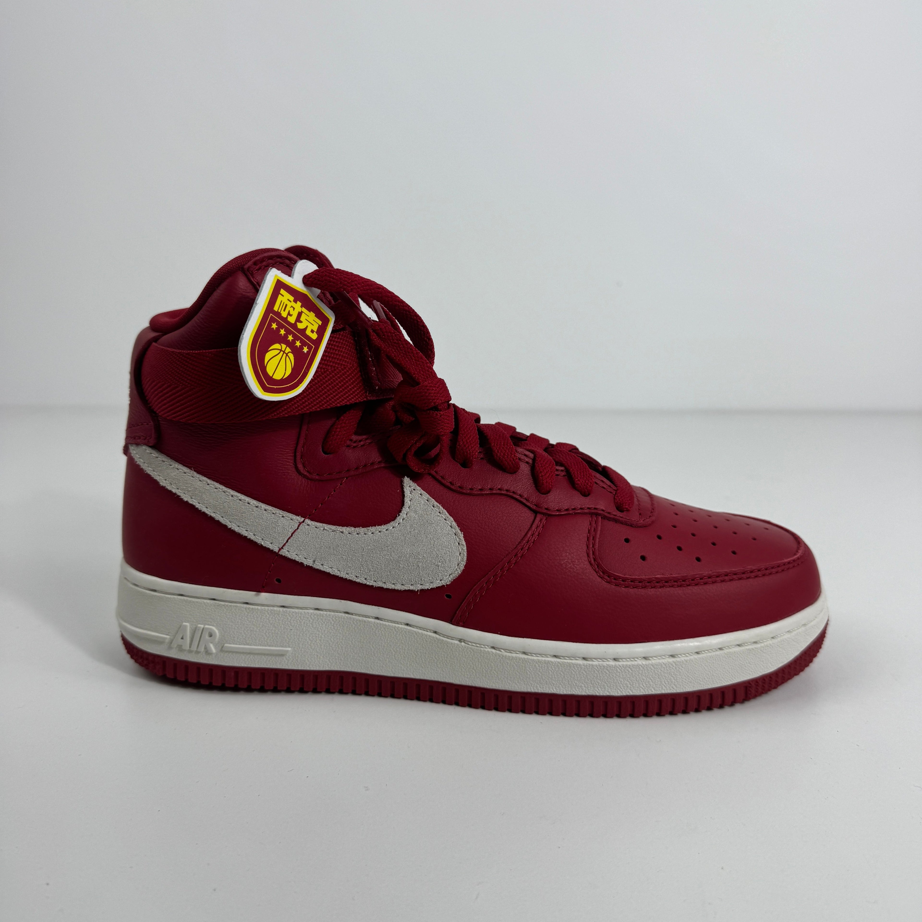 Nike Air Force 1 Hi Retro QS is a premium reissue of the iconic 1982 basketball sneaker, featuring a high-top silhouette,