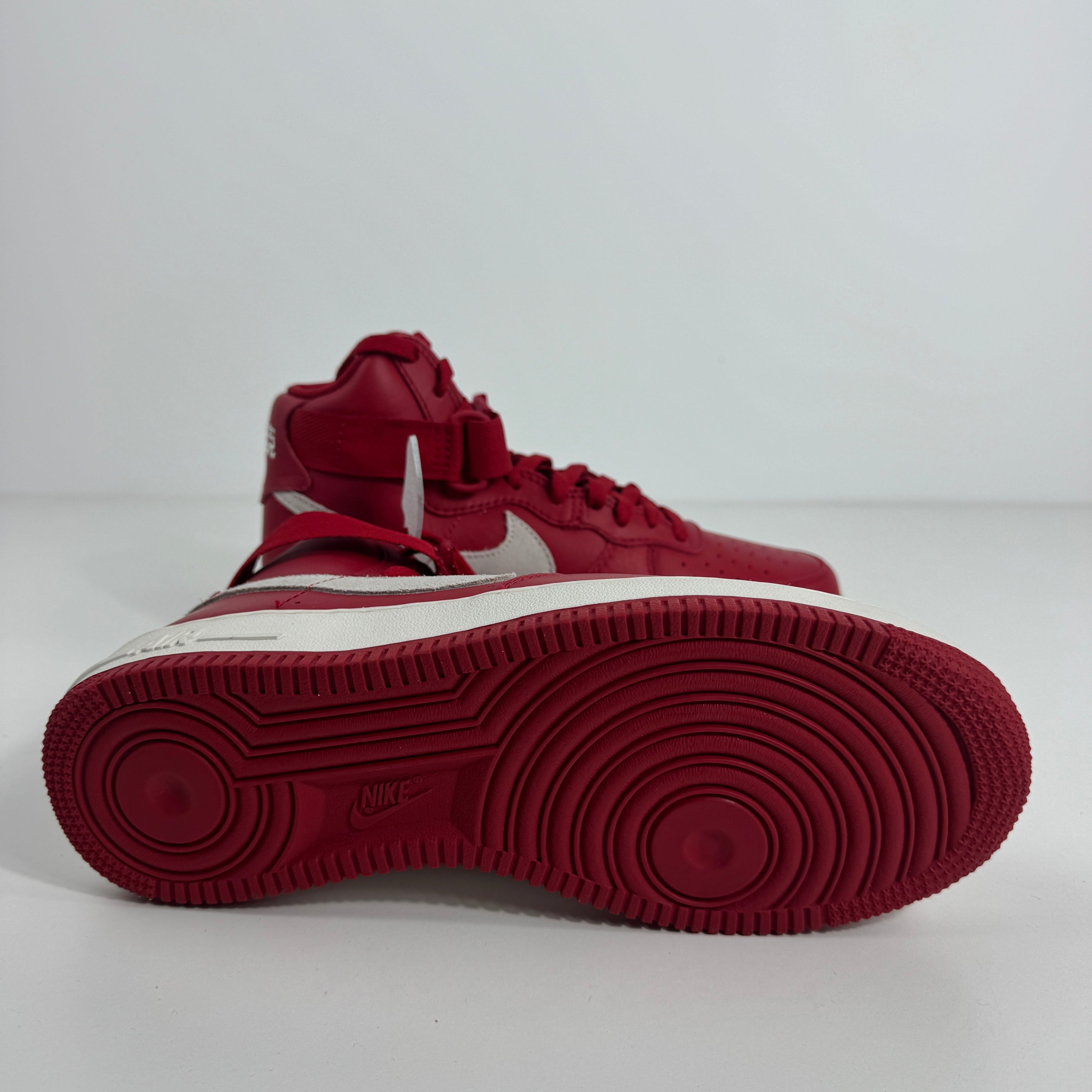 Nike Air Force 1 Hi Retro QS is a premium reissue of the iconic 1982 basketball sneaker, featuring a high-top silhouette,