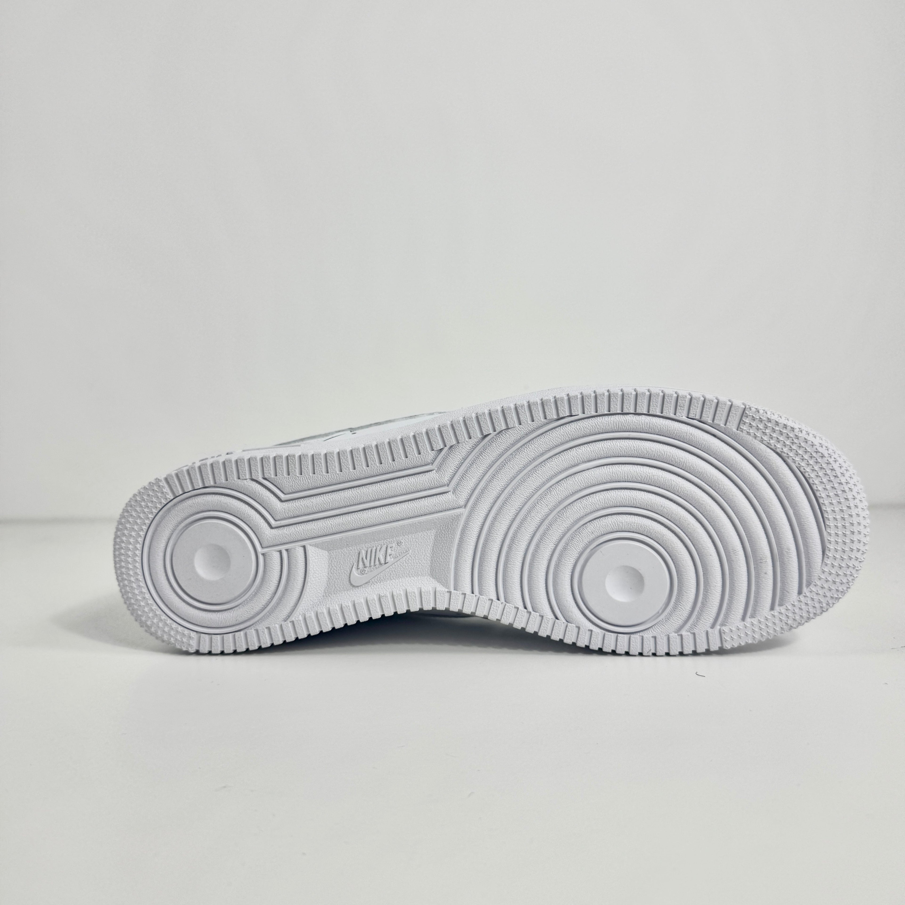 Air Force 1 (Signed by Olaoluslawn) combines the timeless Air Force 1 silhouette with a unique personal touch through