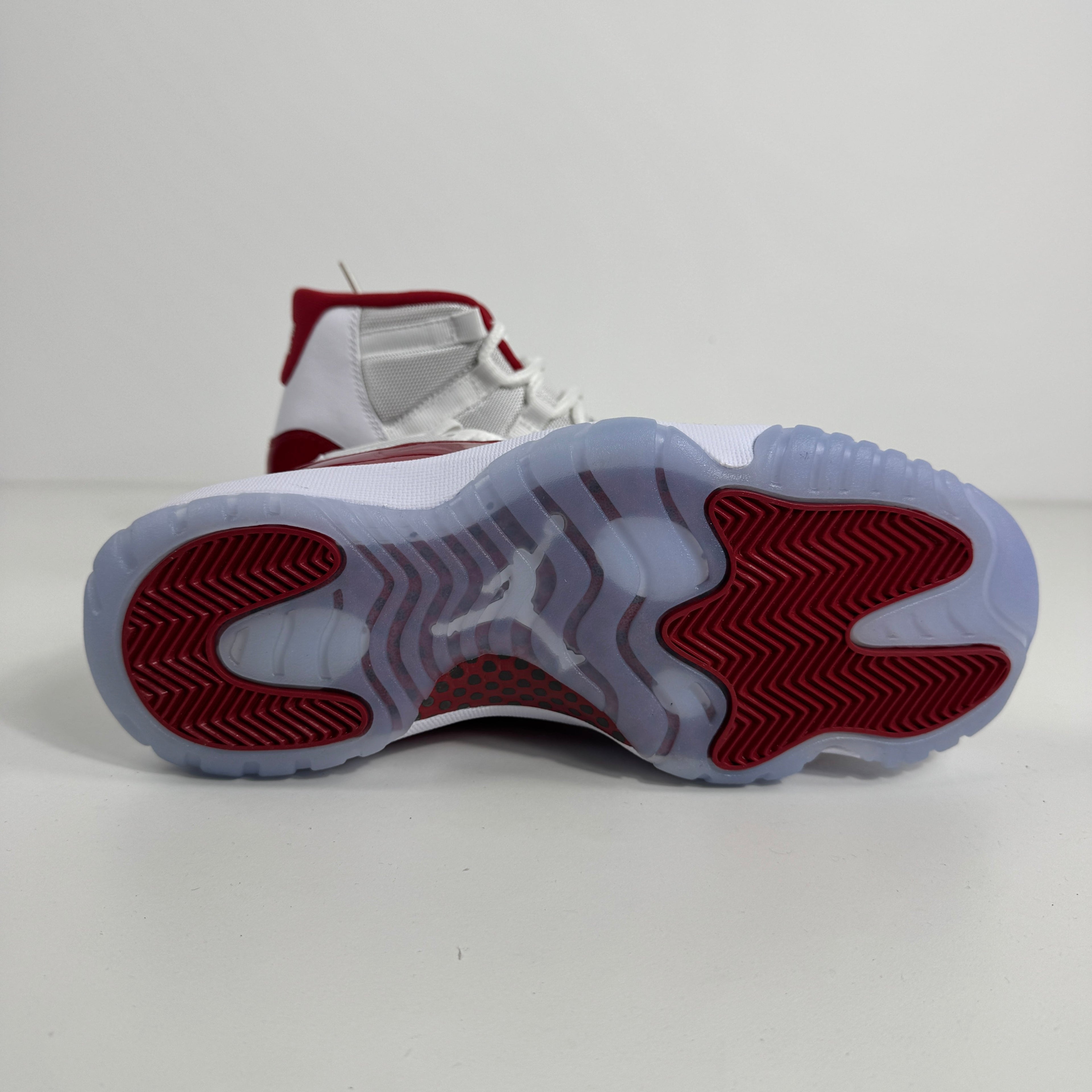 Air Jordan 11 Retro is a legendary basketball sneaker known for its patent leather accents, sleek silhouette, and
