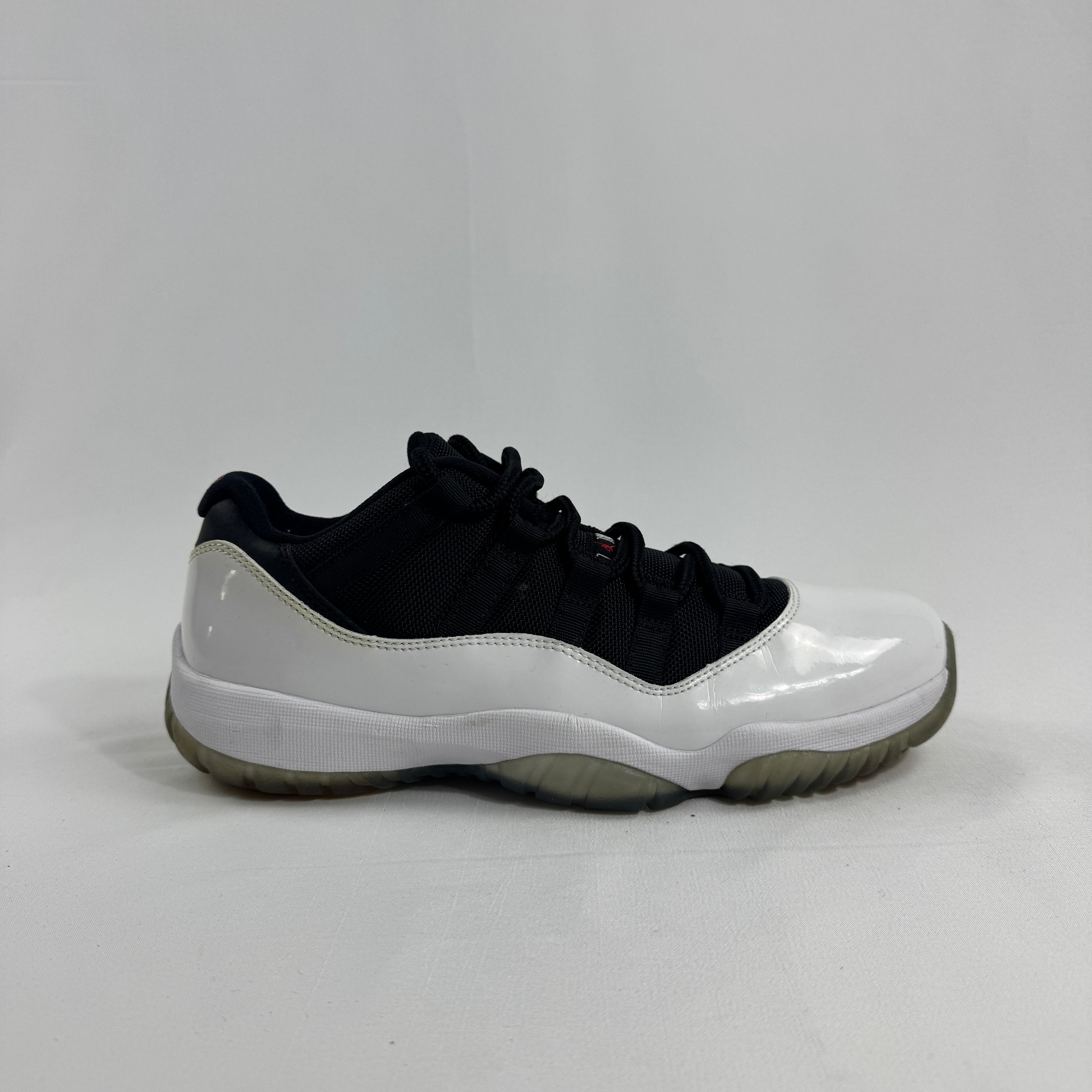 Air Jordan 11 Retro Low “Tuxedo” is a sleek and sophisticated version of the iconic Air Jordan 11. Featuring a clean white