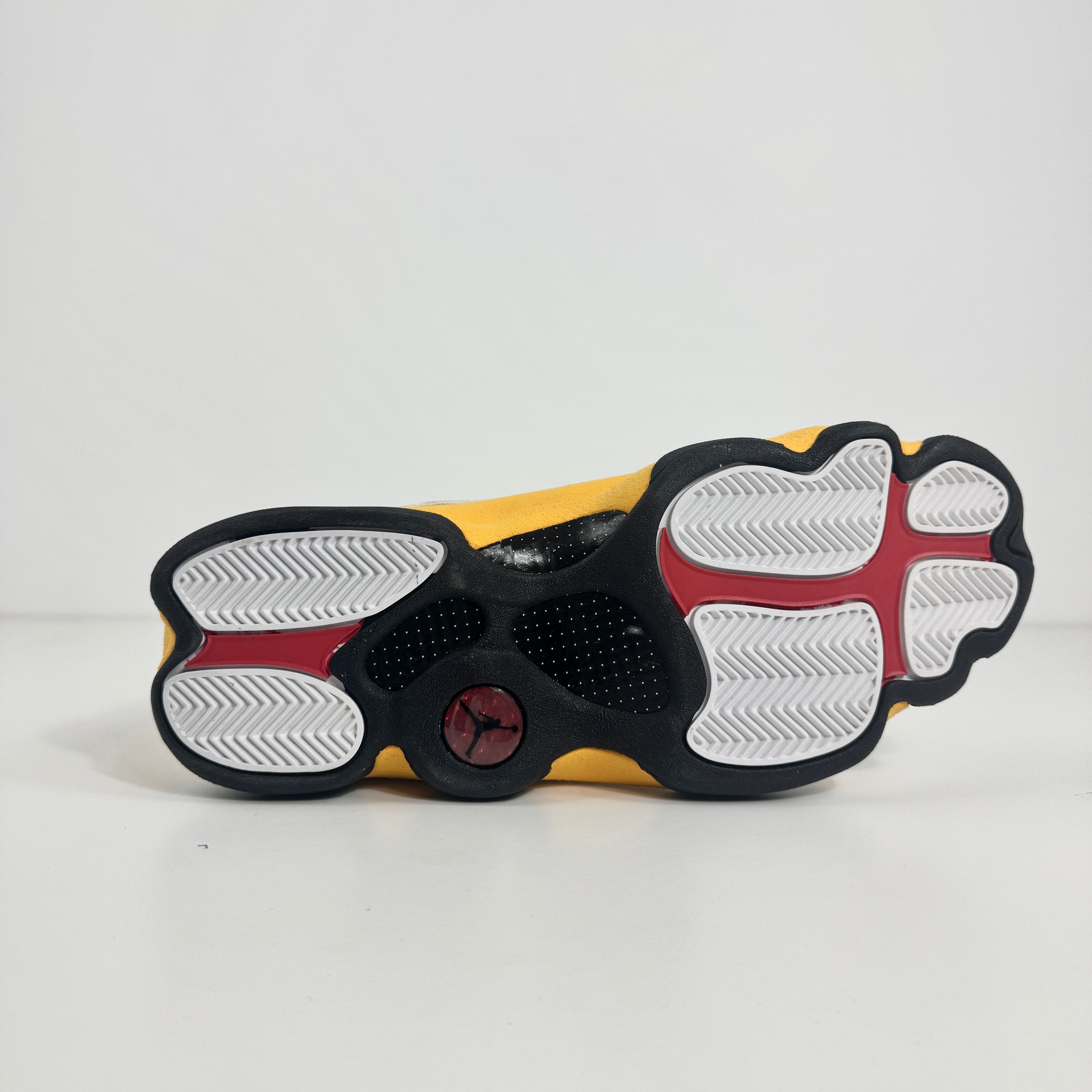 The Air Jordan 13 Retro combines legendary basketball heritage with premium craftsmanship. Featuring iconic design details