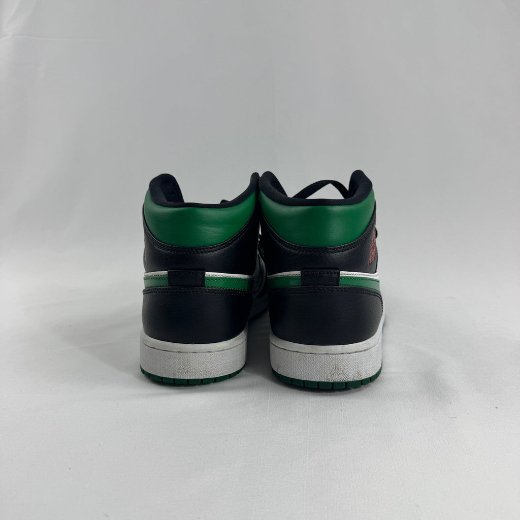 Air Jordan 1 Mid Black/Pine Green is a versatile take on the classic Air Jordan 1 Mid silhouette, featuring a sleek black