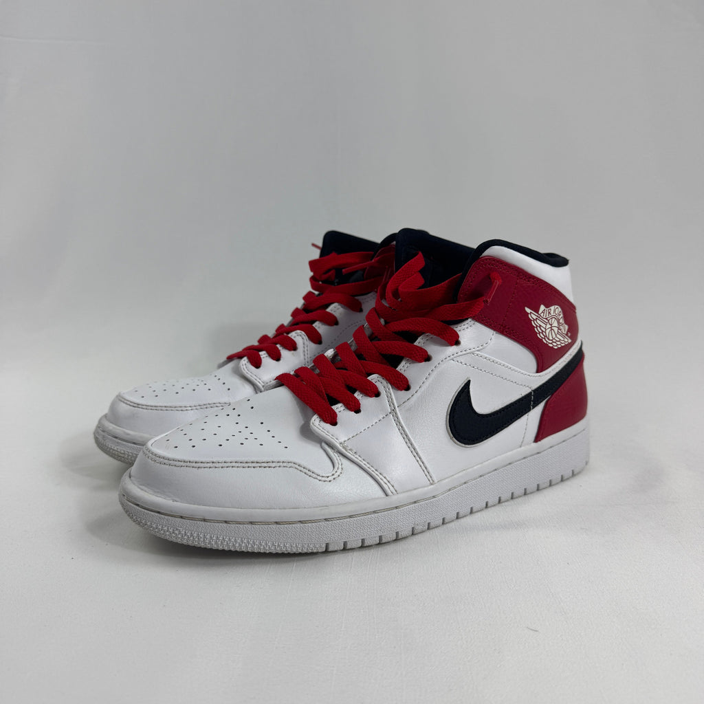 Air Jordan 1 Mid Red/White/Black combines one of the most iconic color palettes in sneaker history with the versatile Air
