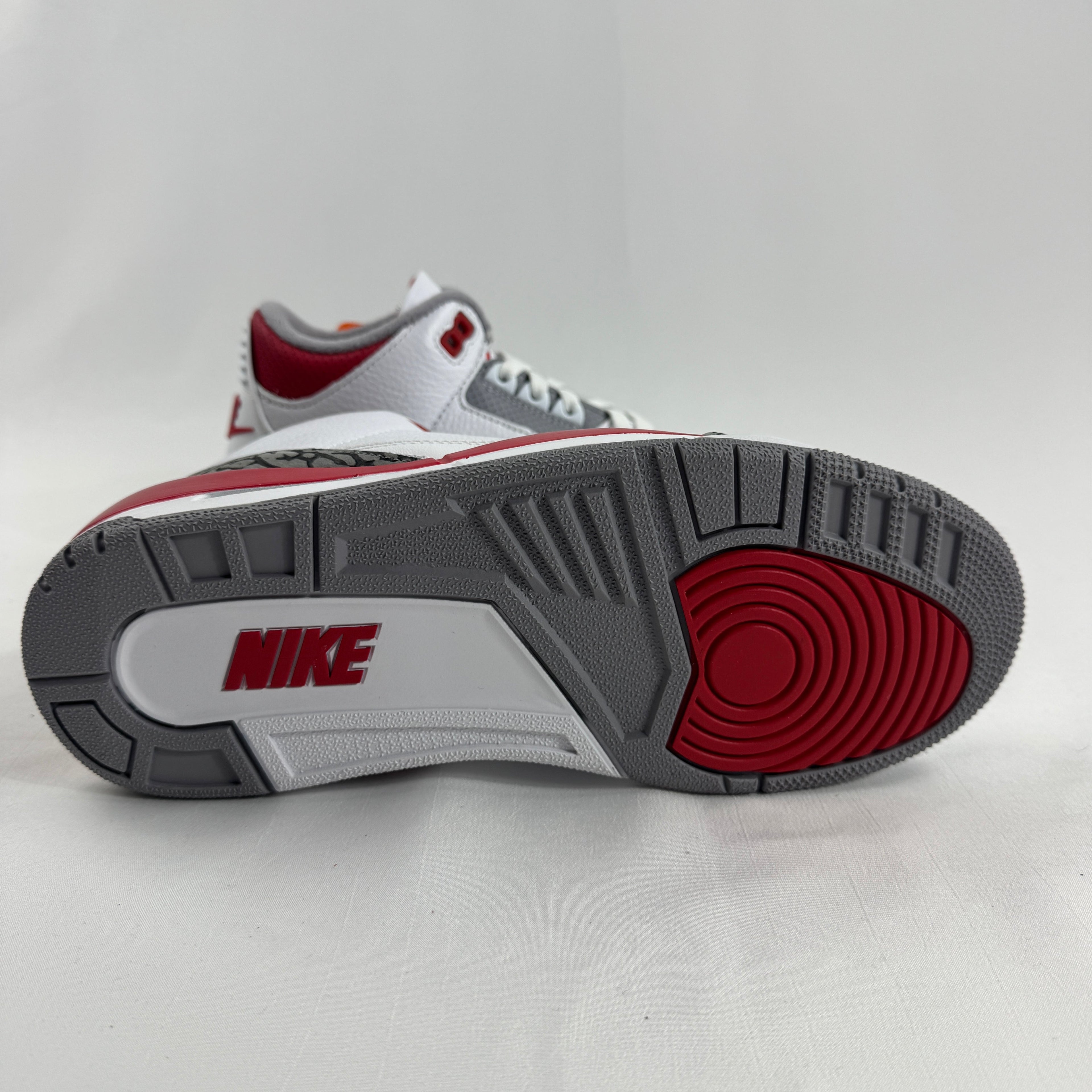 The Air Jordan 3 Retro Cement Grey combines the iconic Air Jordan 3 silhouette with a clean white leather upper, cement grey