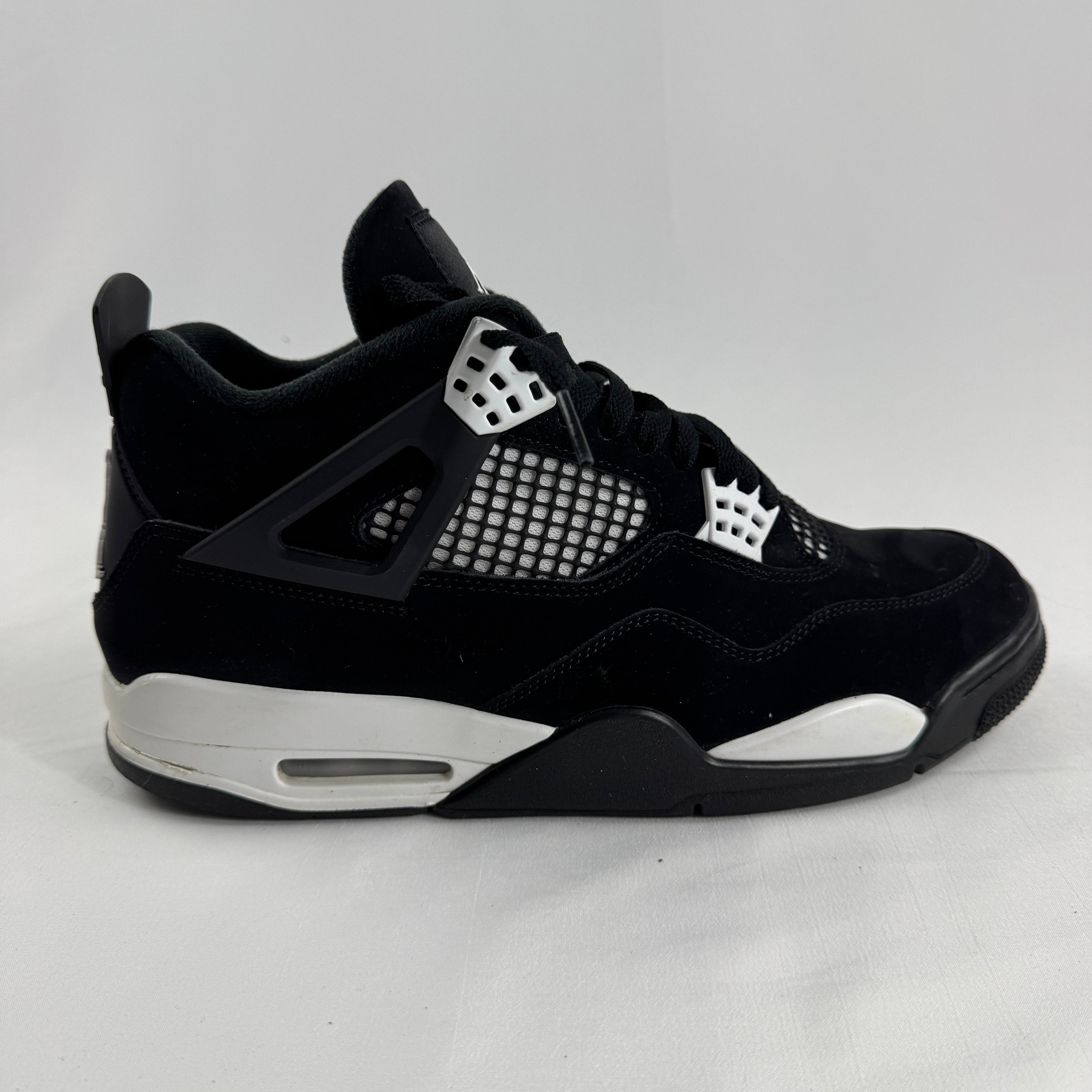 Air Jordan 4 Retro Black/White is a clean, classic version of the Jordan 4 with a black and white leather upper, mesh side