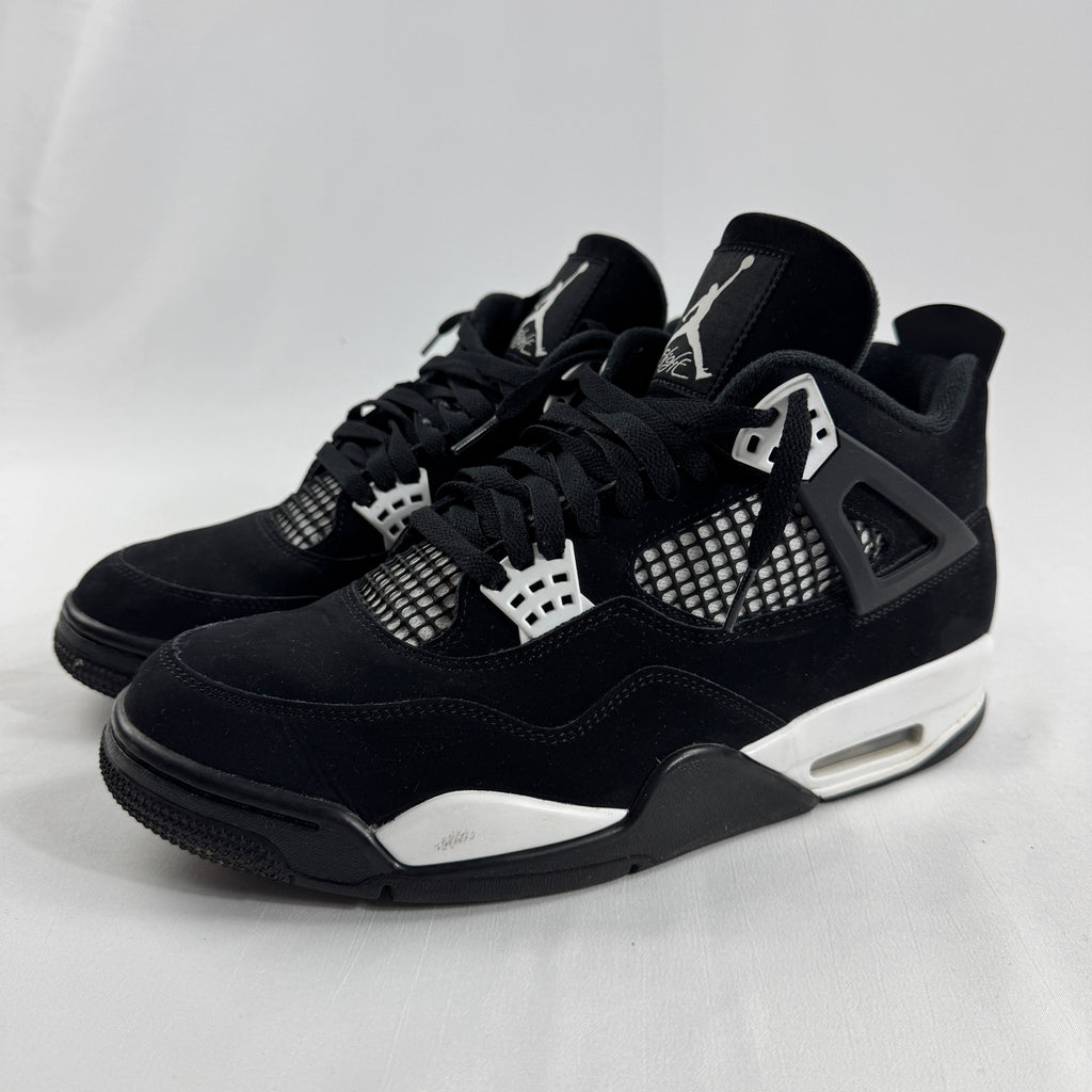 Air Jordan 4 Retro Black/White is a clean, classic version of the Jordan 4 with a black and white leather upper, mesh side