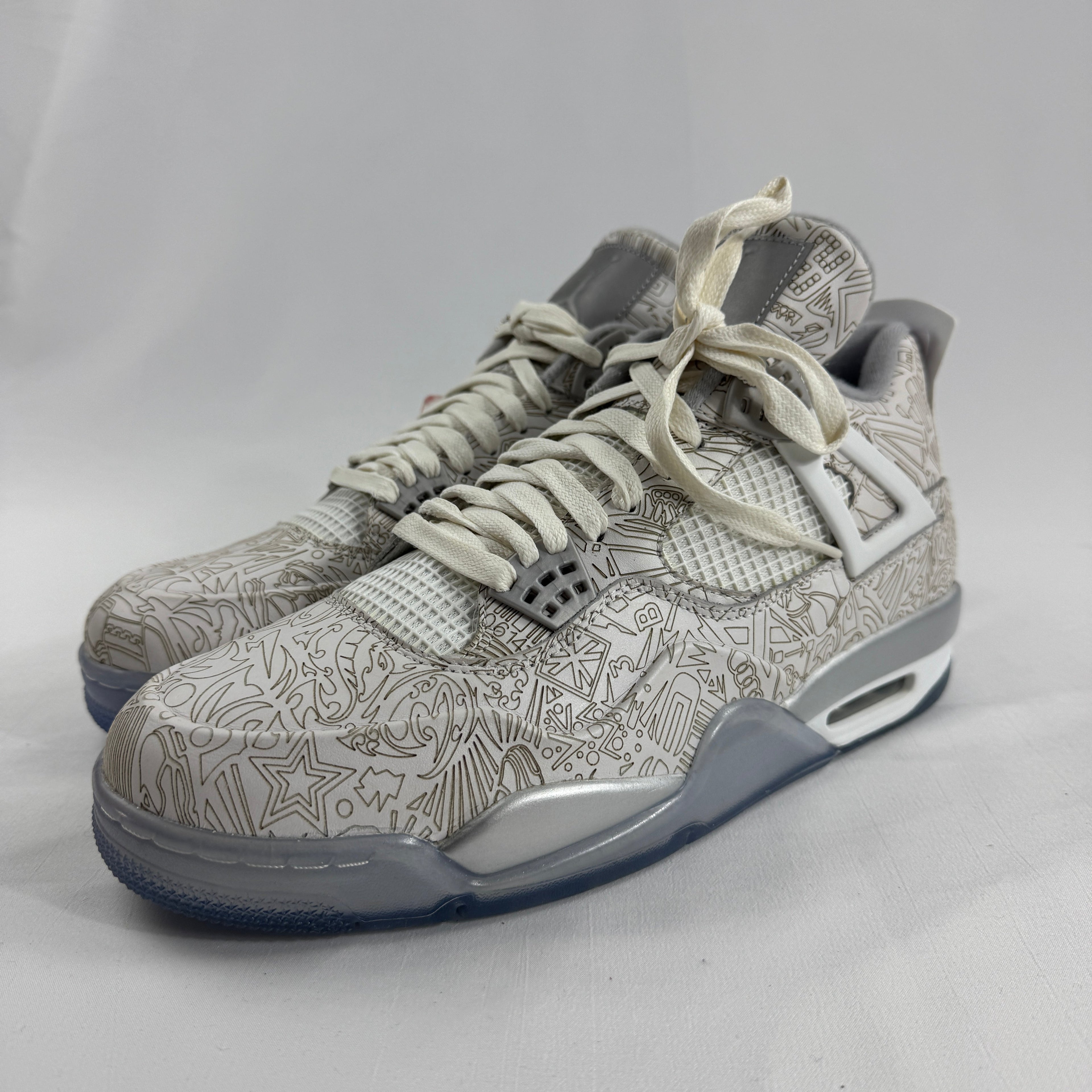 The Air Jordan 4 Retro “Laser” is a special edition of the Jordan 4 that features an all-over laser-etched graphic design