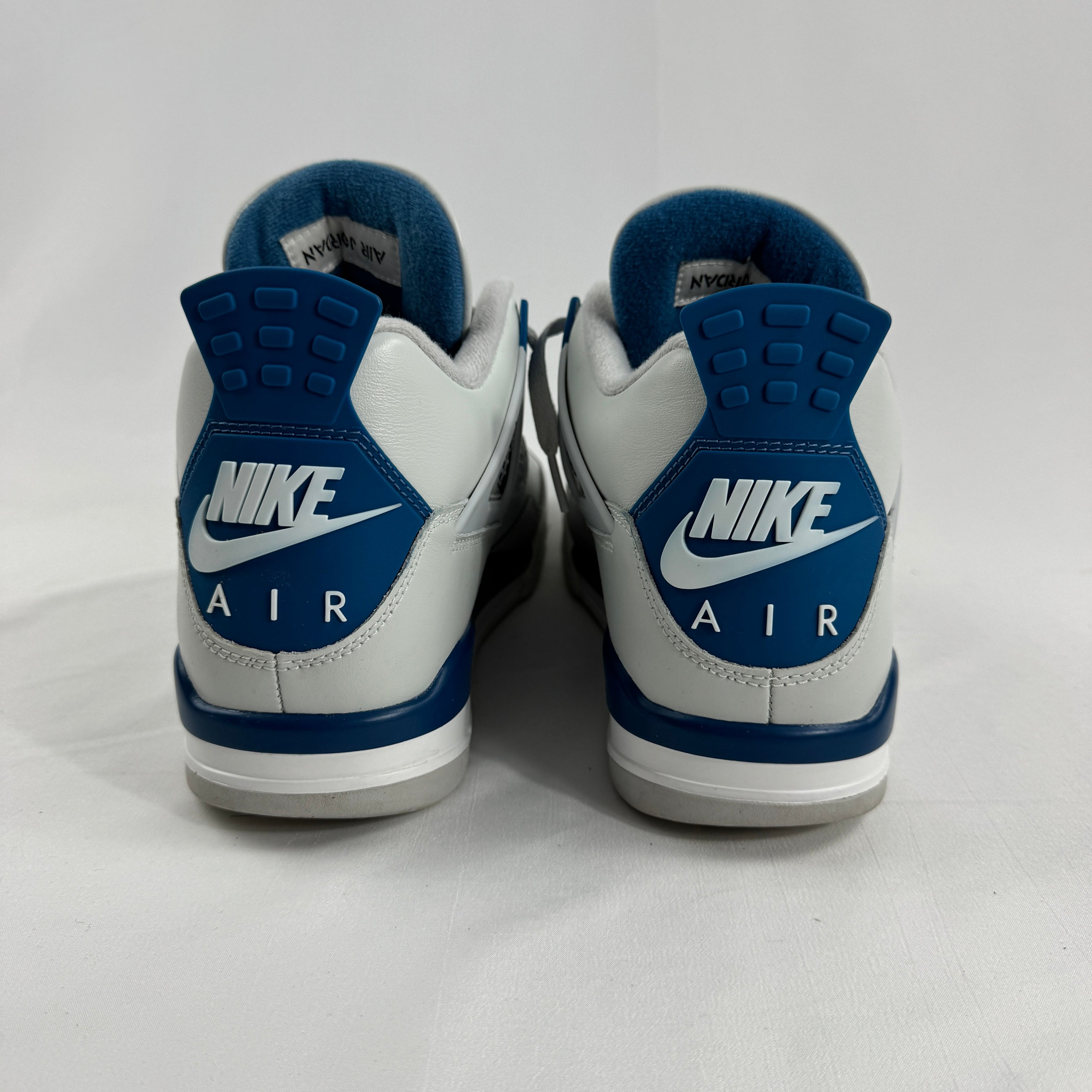 Air Jordan 4 Retro “Off-White Military Blue” is a special collaboration-inspired version of the classic Jordan 4 featuring a
