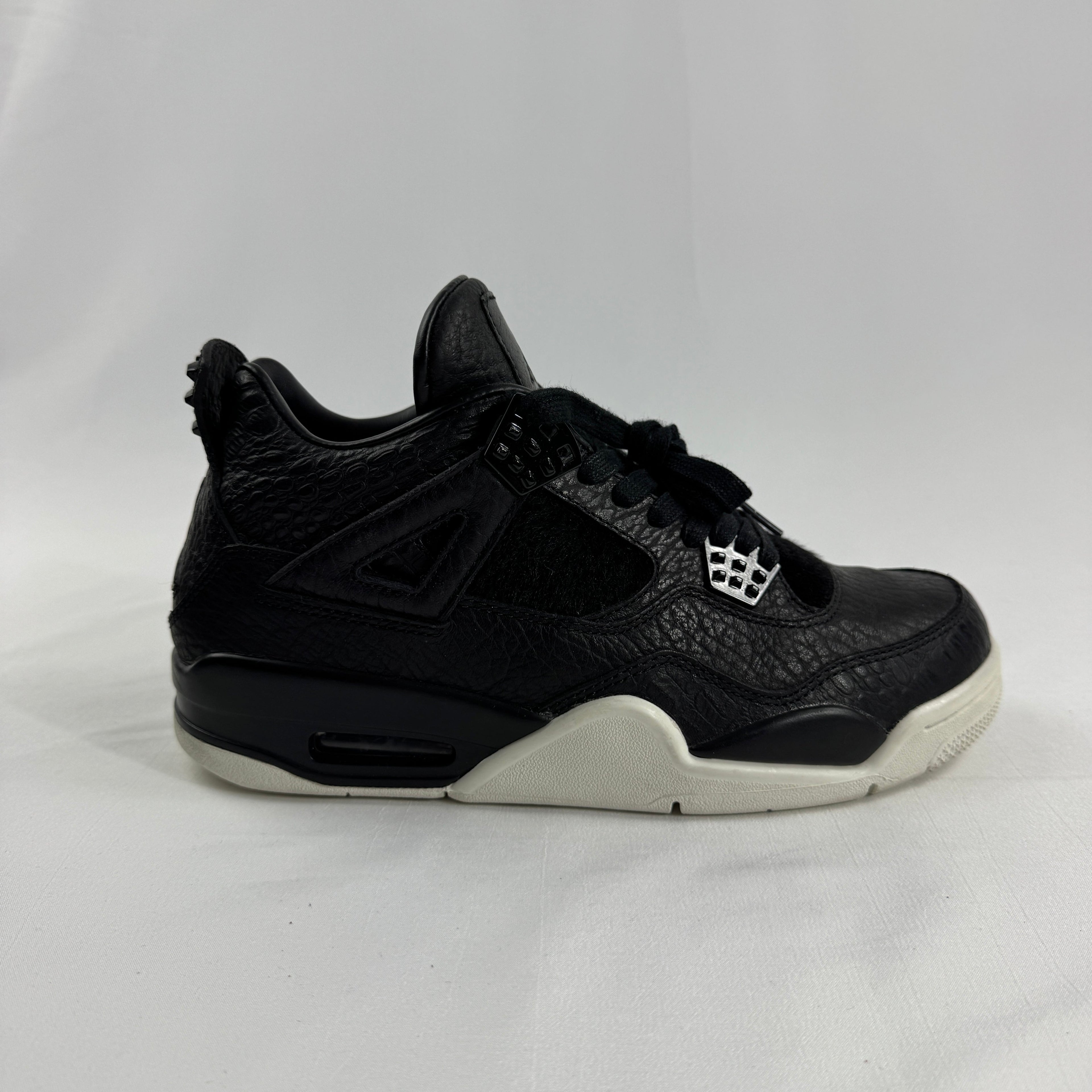 The Air Jordan 4 Retro Premium is a luxury reinterpretation of the classic Air Jordan 4 silhouette, focusing on high-end