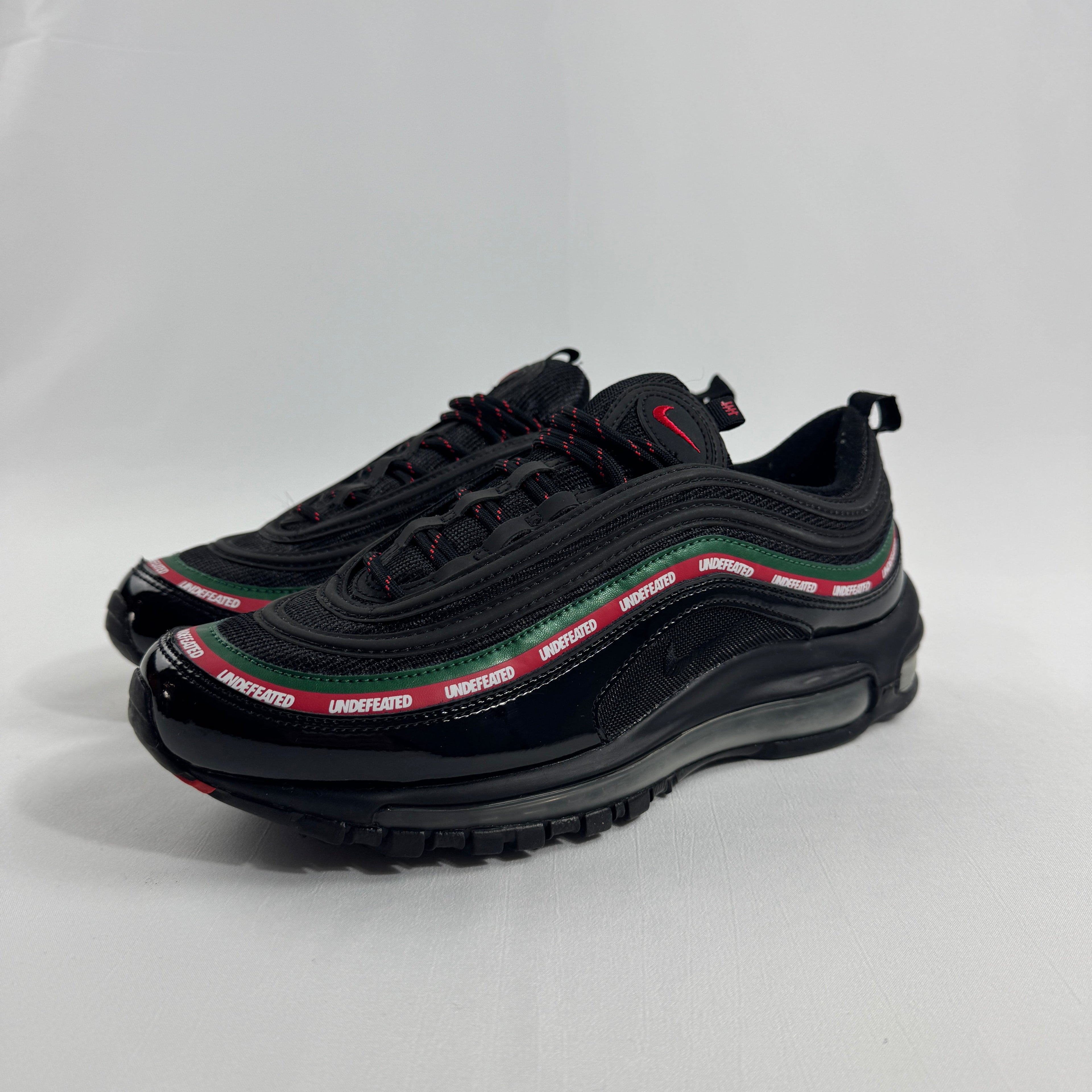 Air Max 97 Undefeated Black Volt combines the iconic Air Max 97 design with Undefeated’s bold streetwear aesthetic.
